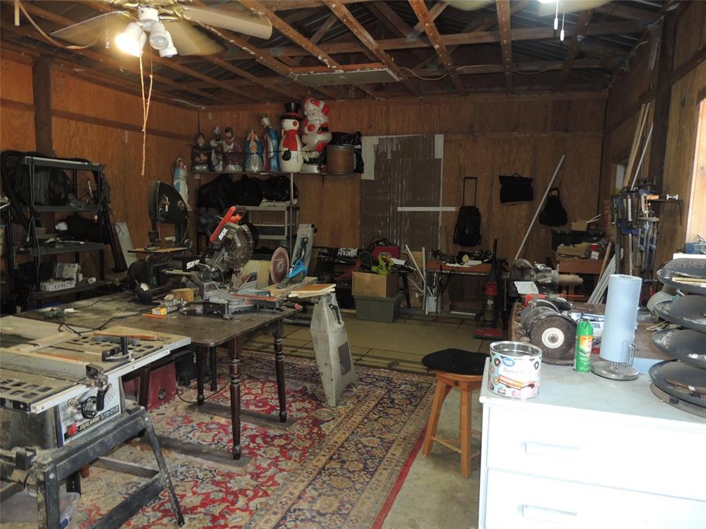 7050 Southeast Co Road 337 Morriston, FL 32668 - Photo 20 of 67 a view of a room with gym equipment