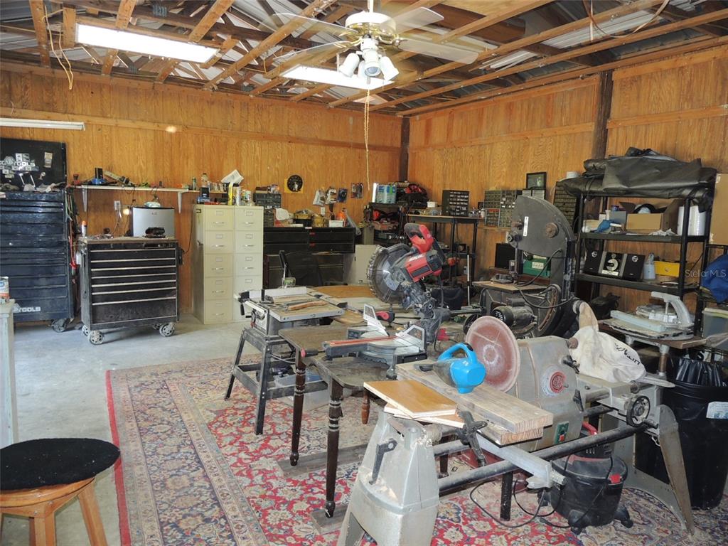 7050 Southeast Co Road 337 Morriston, FL 32668 - Photo 22 of 67 a outdoor space with lots of tables and chairs