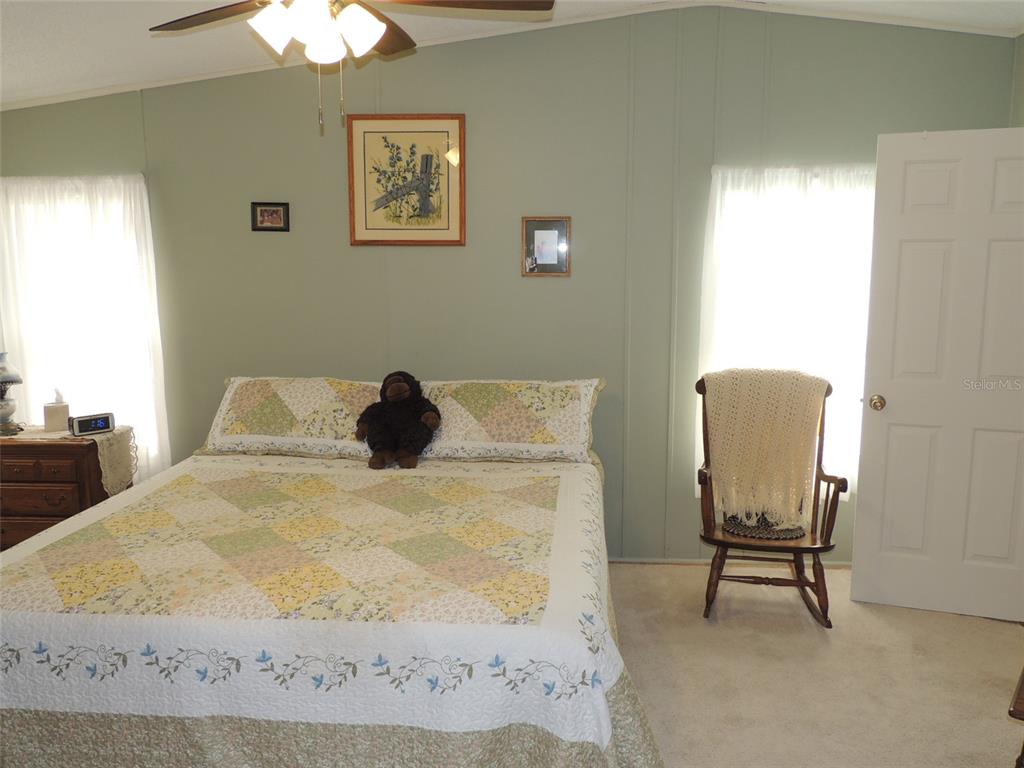 7050 Southeast Co Road 337 Morriston, FL 32668 - Photo 49 of 67 a view of a workspace with furniture and a window