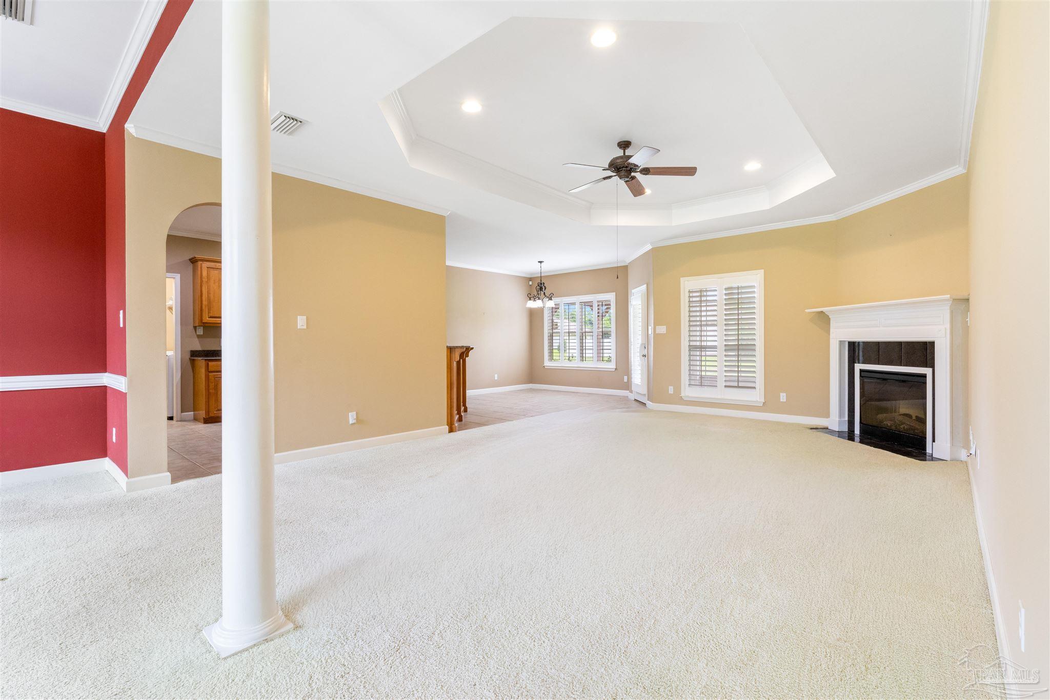 26064 Chatelaine Road Elberta, AL 36530 - Photo 16 of 52 a view of an empty room with a fireplace