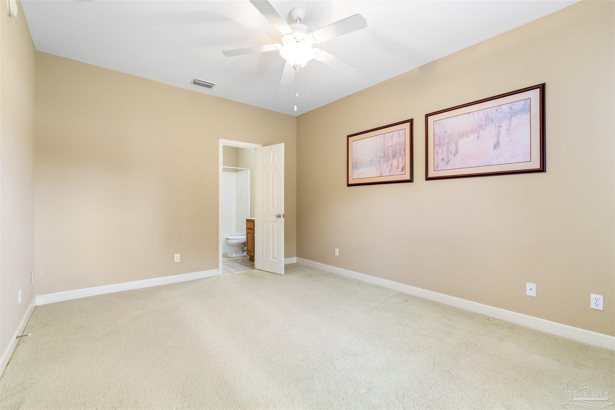 26064 Chatelaine Road Elberta, AL 36530 - Photo 21 of 52 an empty room with a fan & a window