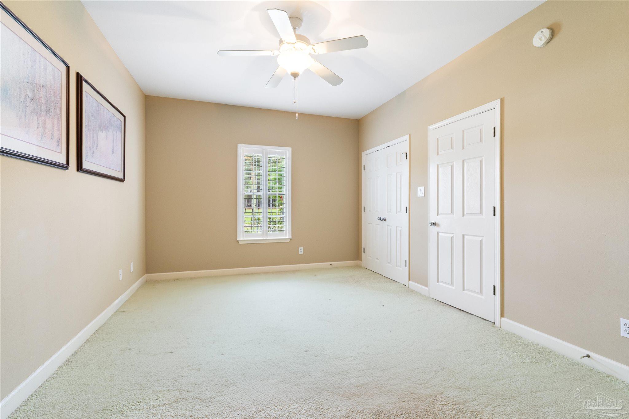 26064 Chatelaine Road Elberta, AL 36530 - Photo 22 of 52 a view of an empty room with a window
