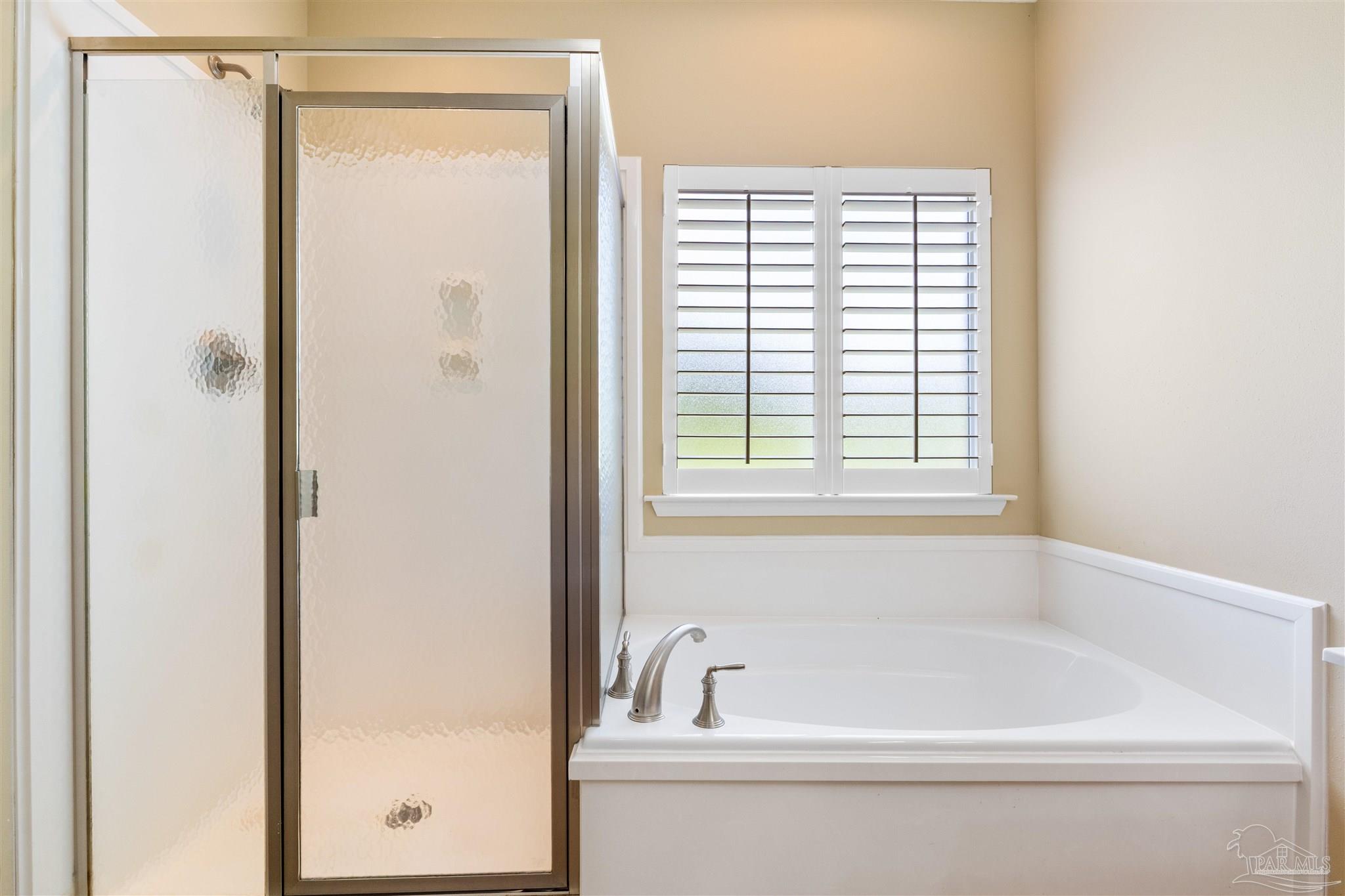26064 Chatelaine Road Elberta, AL 36530 - Photo 25 of 52 a white bath tub sitting next to a window