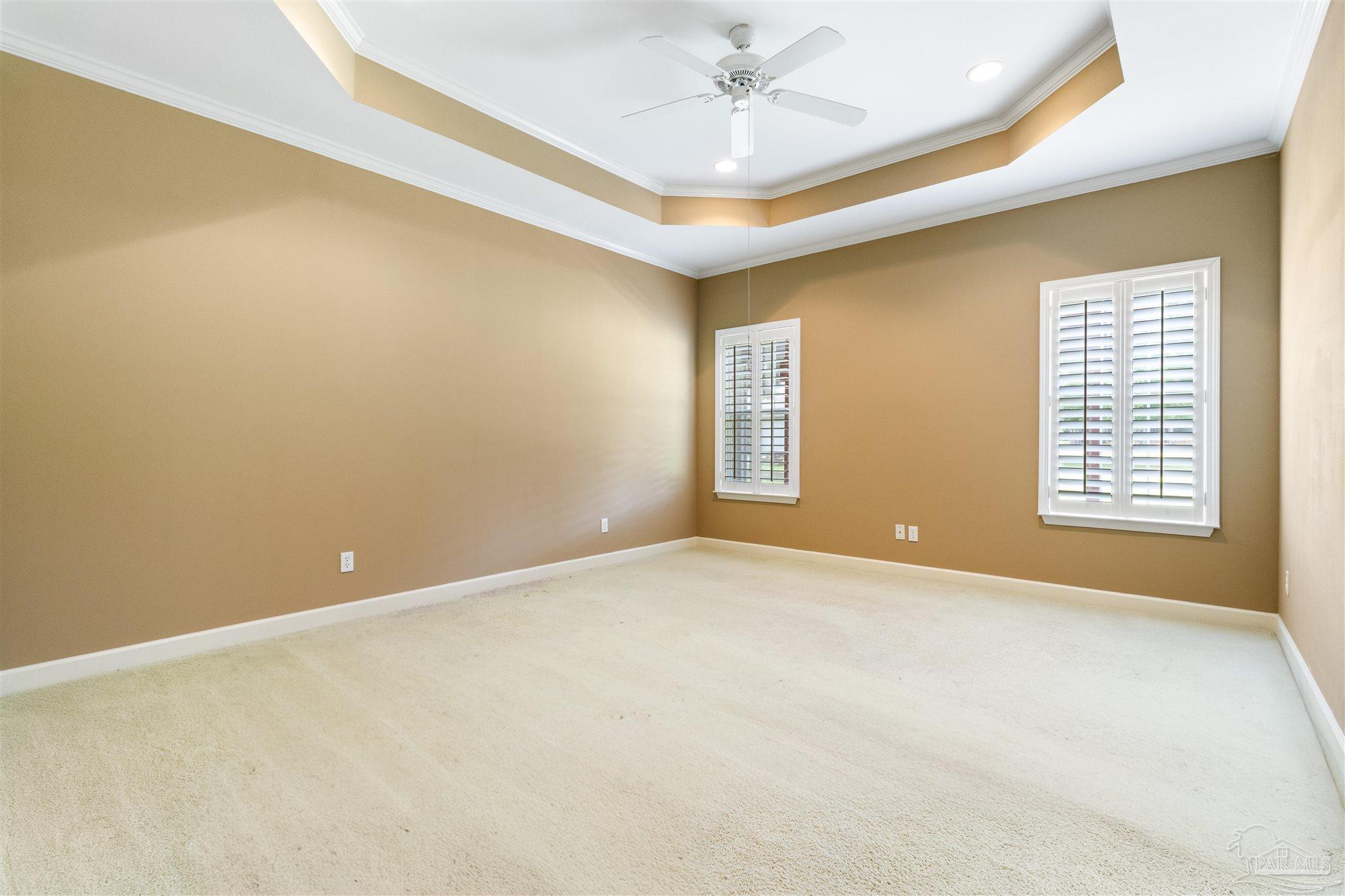 26064 Chatelaine Road Elberta, AL 36530 - Photo 27 of 52 a view of an empty room with chandelier fan and a window