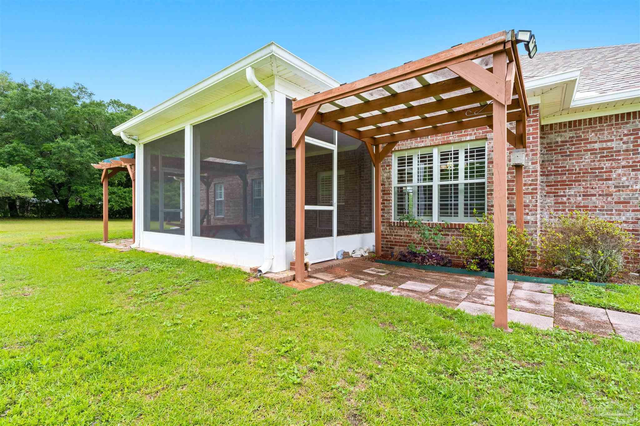 26064 Chatelaine Road Elberta, AL 36530 - Photo 34 of 52 front view of a house with a yard