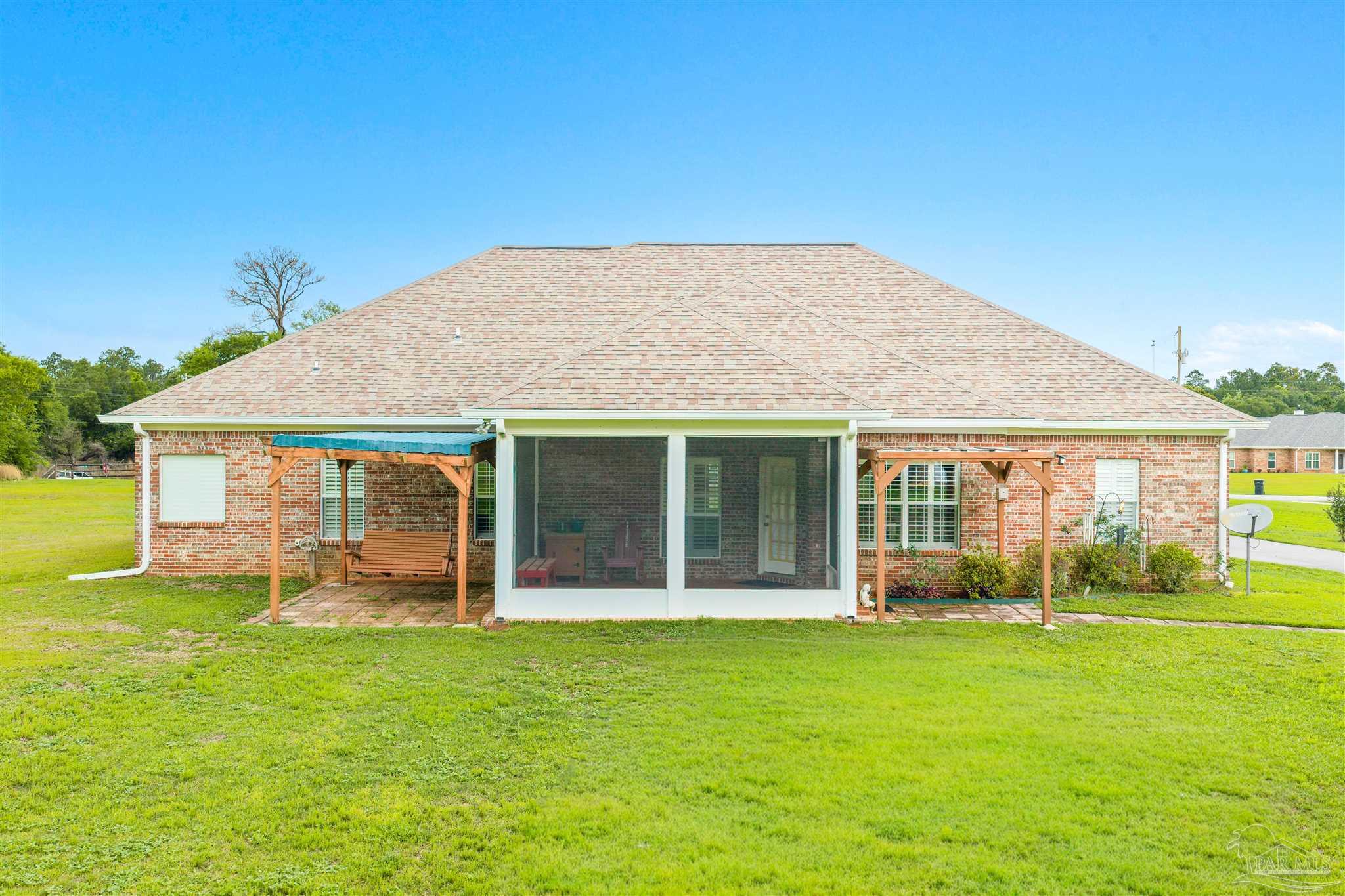 26064 Chatelaine Road Elberta, AL 36530 - Photo 37 of 52 front view of a house with a yard