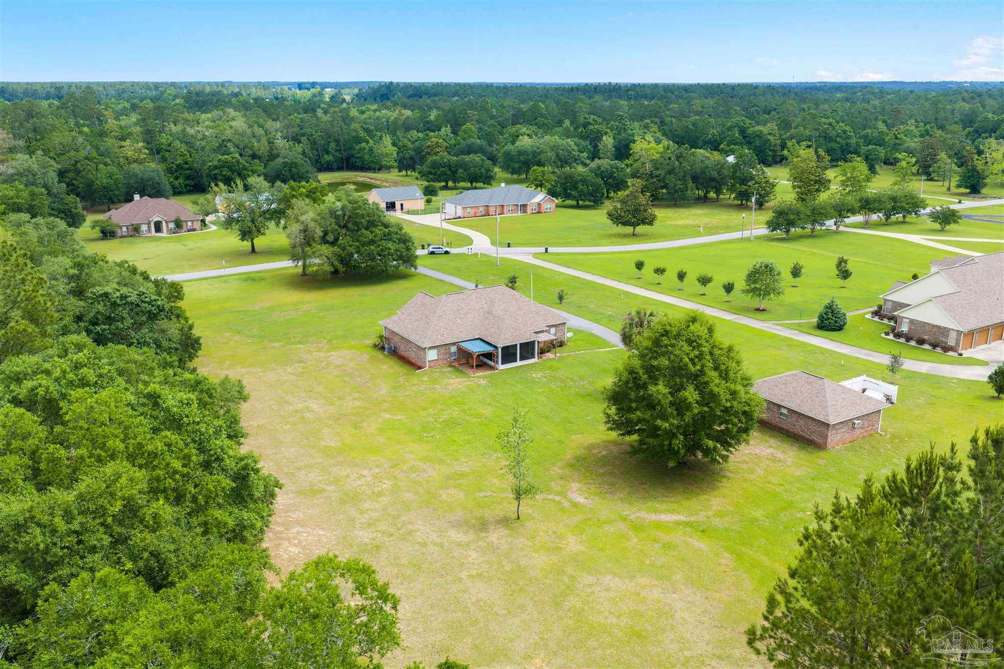 26064 Chatelaine Road Elberta, AL 36530 - Photo 43 of 52 a view of a swimming pool and a yard