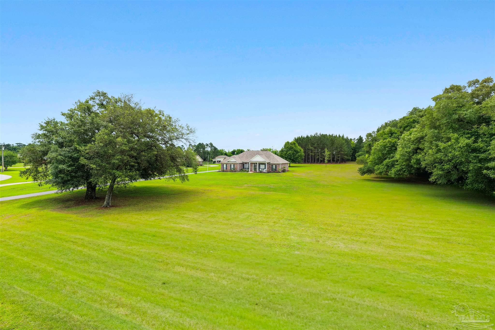 26064 Chatelaine Road Elberta, AL 36530 - Photo 45 of 52 a view of an ocean from a yard