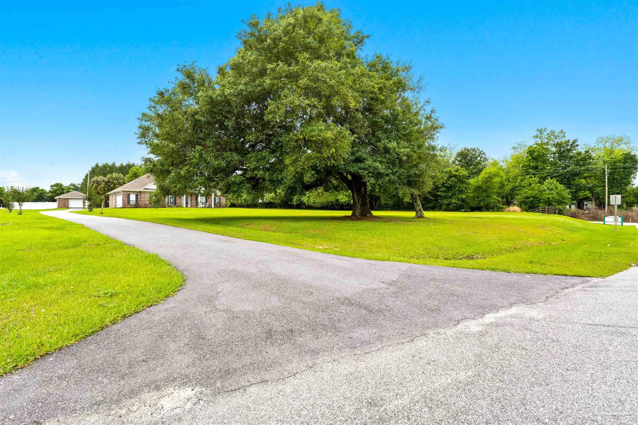 26064 Chatelaine Road Elberta, AL 36530 - Photo 47 of 52 a view of a golf course with a trees