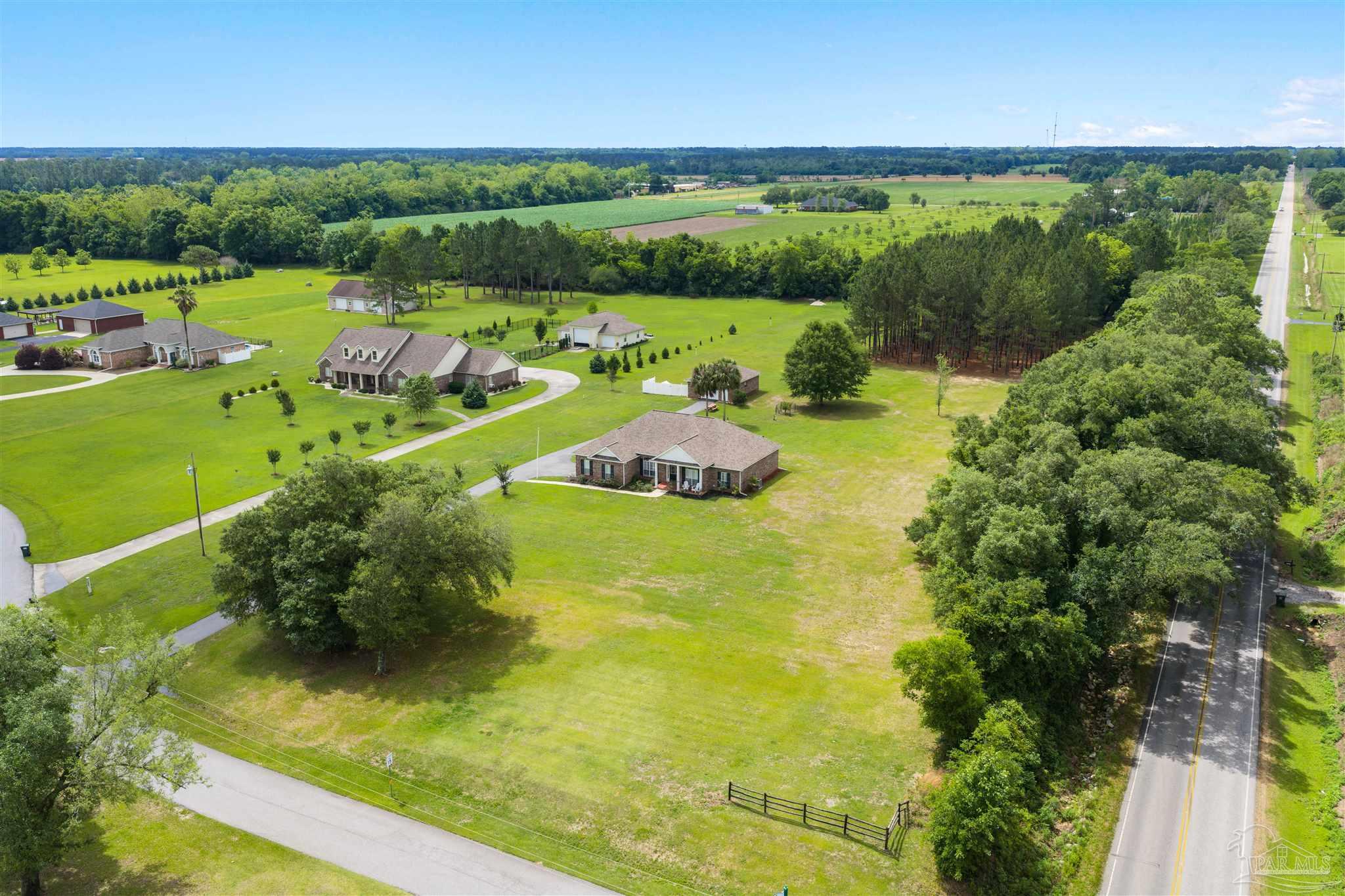 26064 Chatelaine Road Elberta, AL 36530 - Photo 49 of 52 a view of a lake with a houses