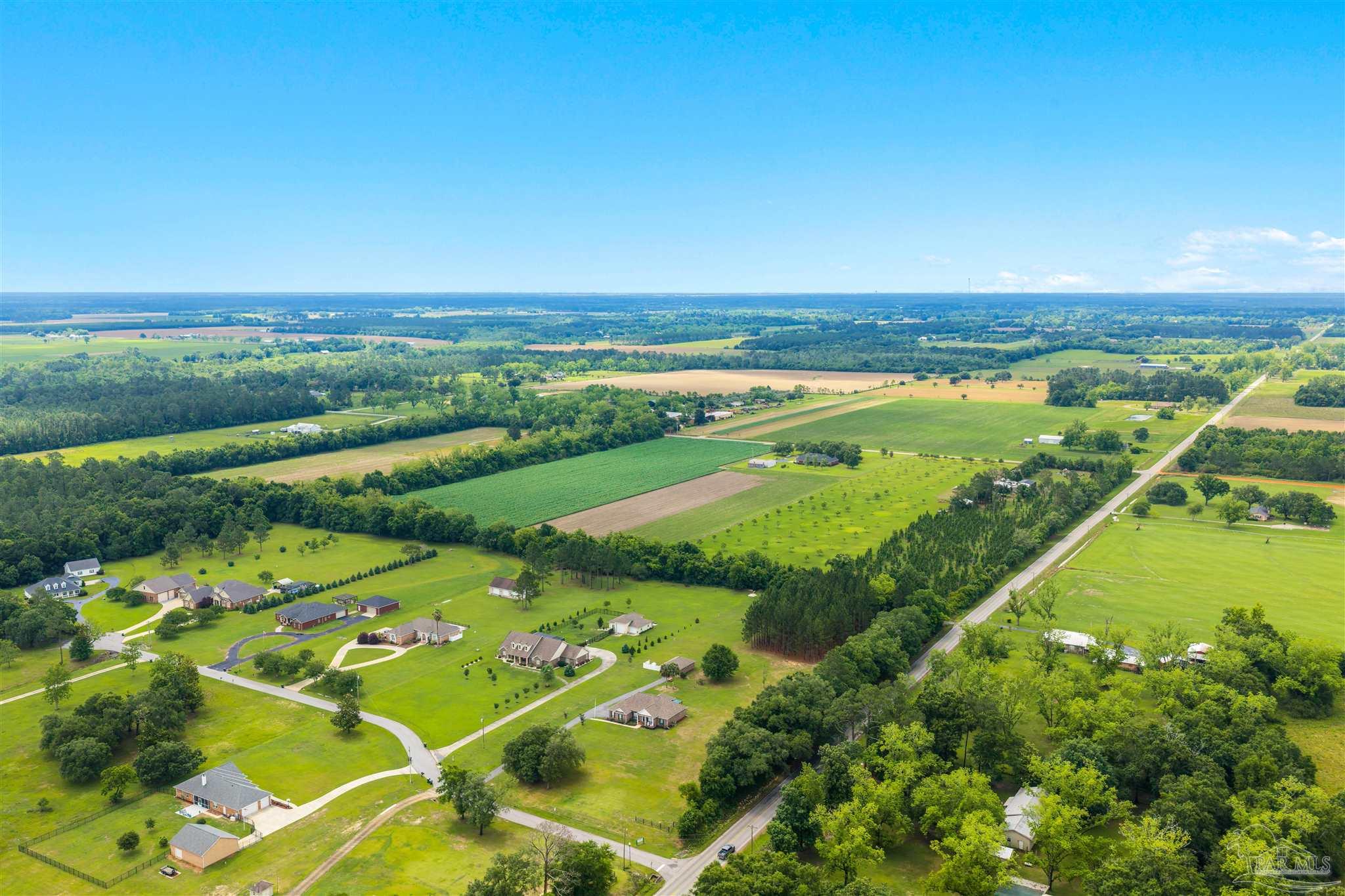 26064 Chatelaine Road Elberta, AL 36530 - Photo 51 of 52 a view of an ocean and a yard
