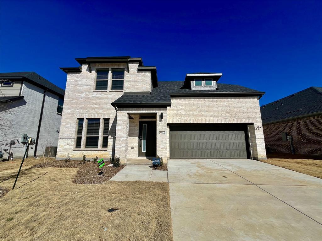 1904 Edgewater Street Celina, TX 75009 - Photo 1 of 11 a front view of a house with a yard