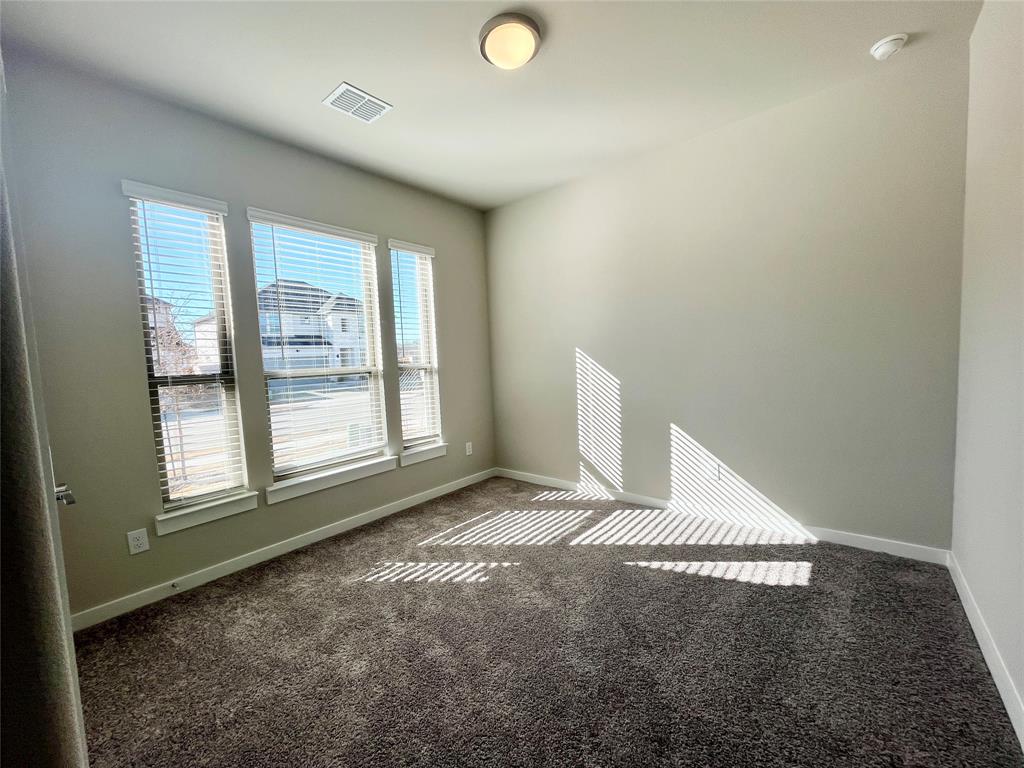1904 Edgewater Street Celina, TX 75009 - Photo 3 of 11 a view of an empty room and window