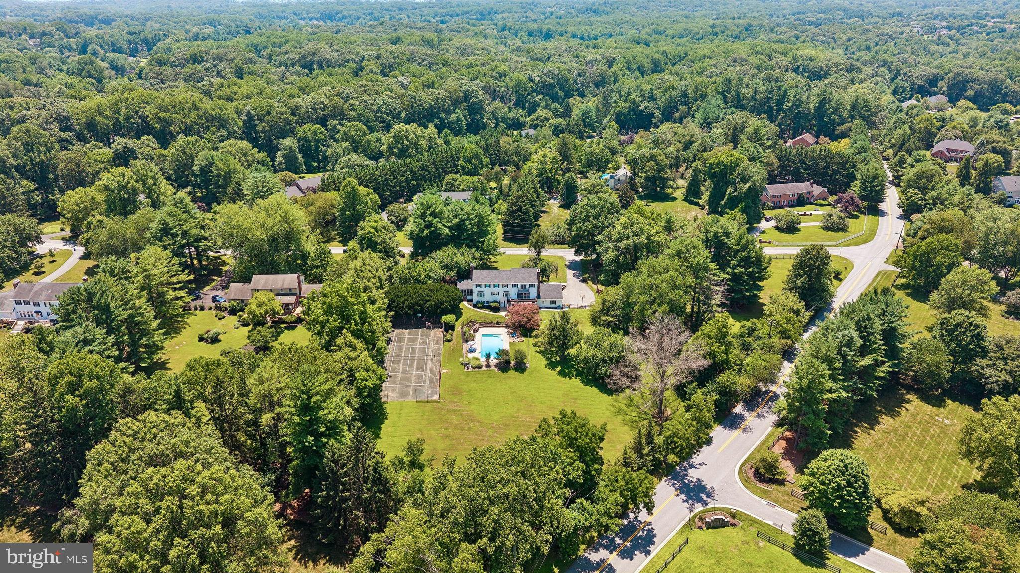 13021 Gent Road Reisterstown, MD 21136 - Photo 41 of 42 Lush greenery surrounds a serene home.