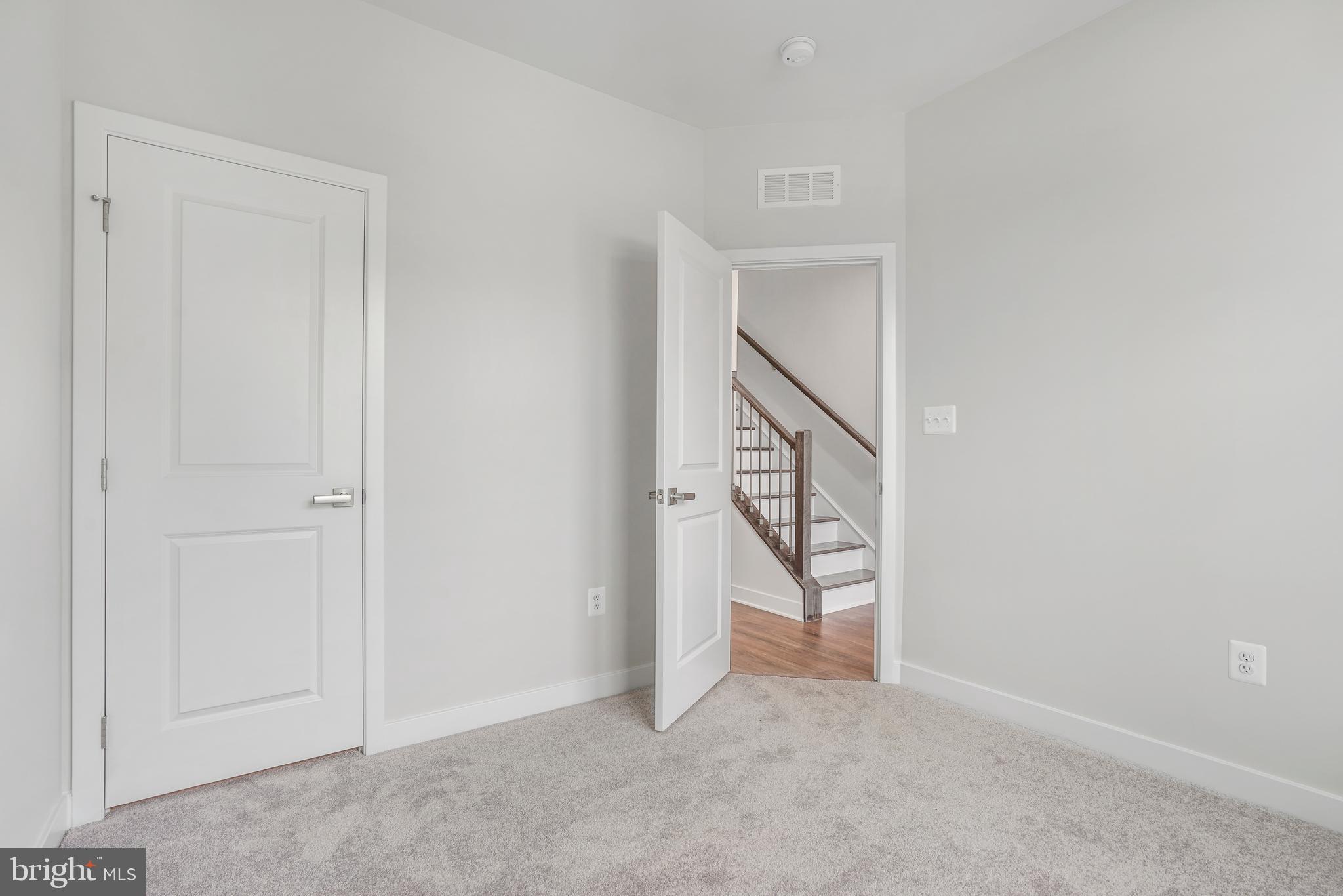 4770 Towne Square Boulevard Suitland, MD 20746 - Photo 6 of 11 Ground Level bedroom