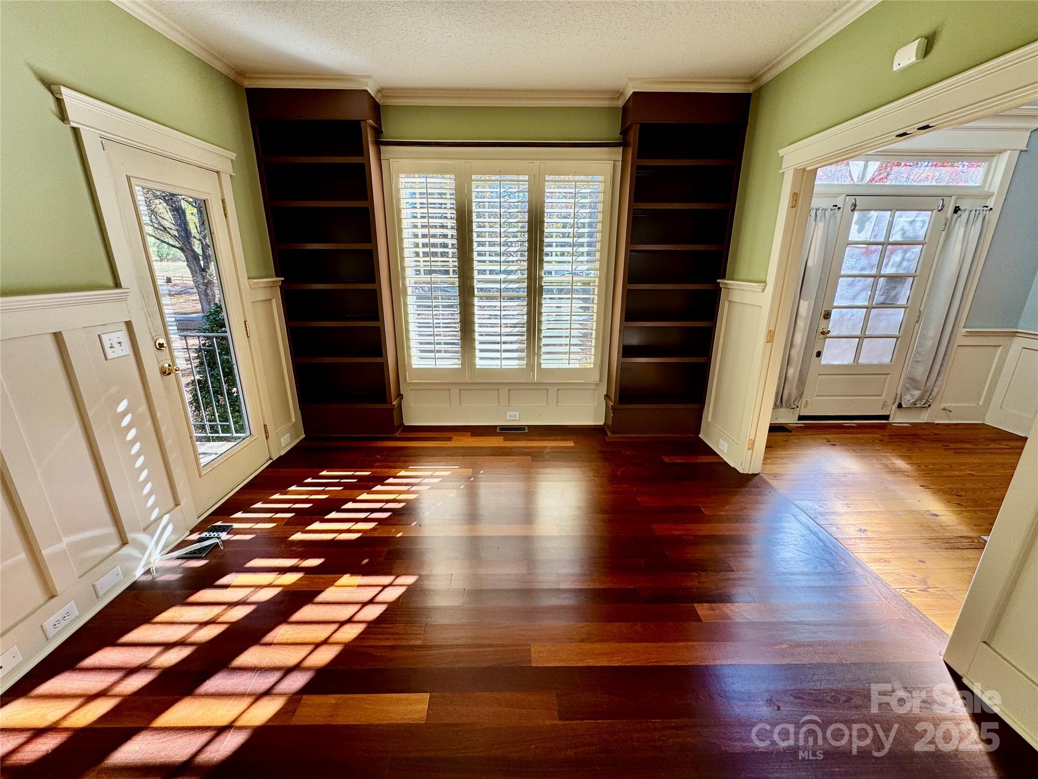 600 Baron Road Waxhaw, NC 28173 - Photo 13 of 42 a view of an entryway with wooden floor and door