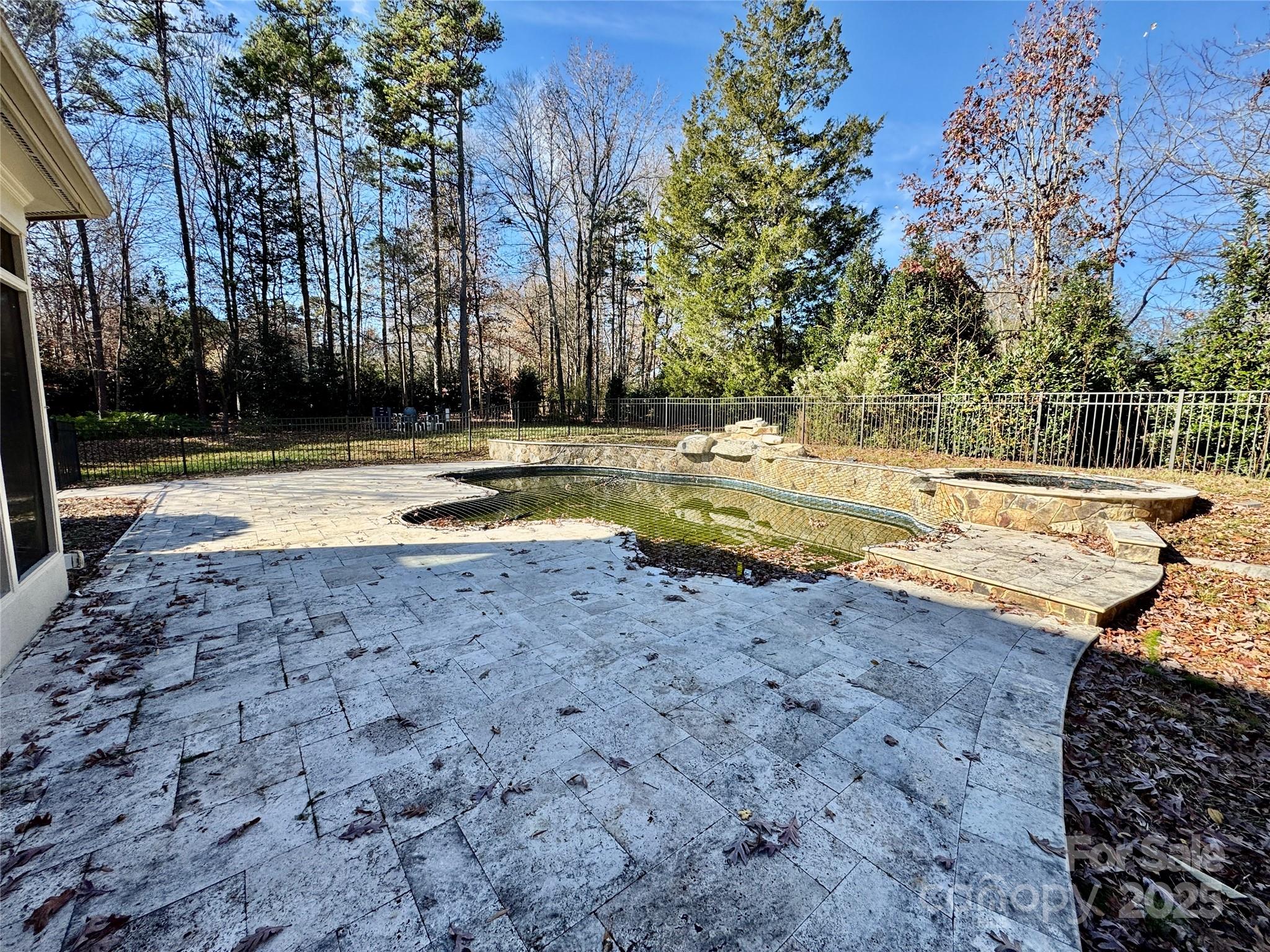 600 Baron Road Waxhaw, NC 28173 - Photo 41 of 42 a view of yard with swimming pool and trees in the background