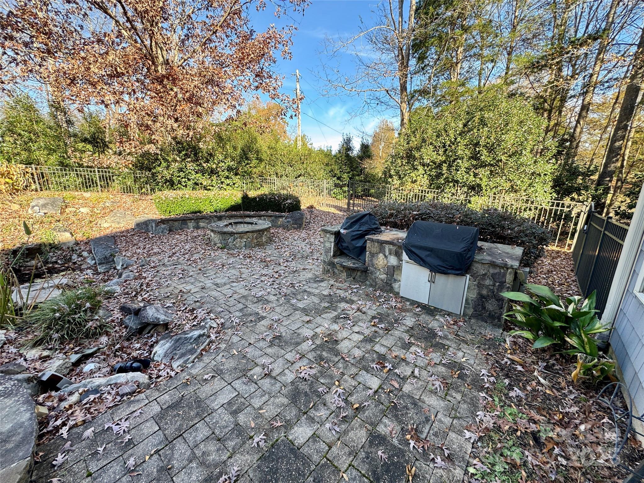 600 Baron Road Waxhaw, NC 28173 - Photo 42 of 42 a backyard of a house with table and chairs