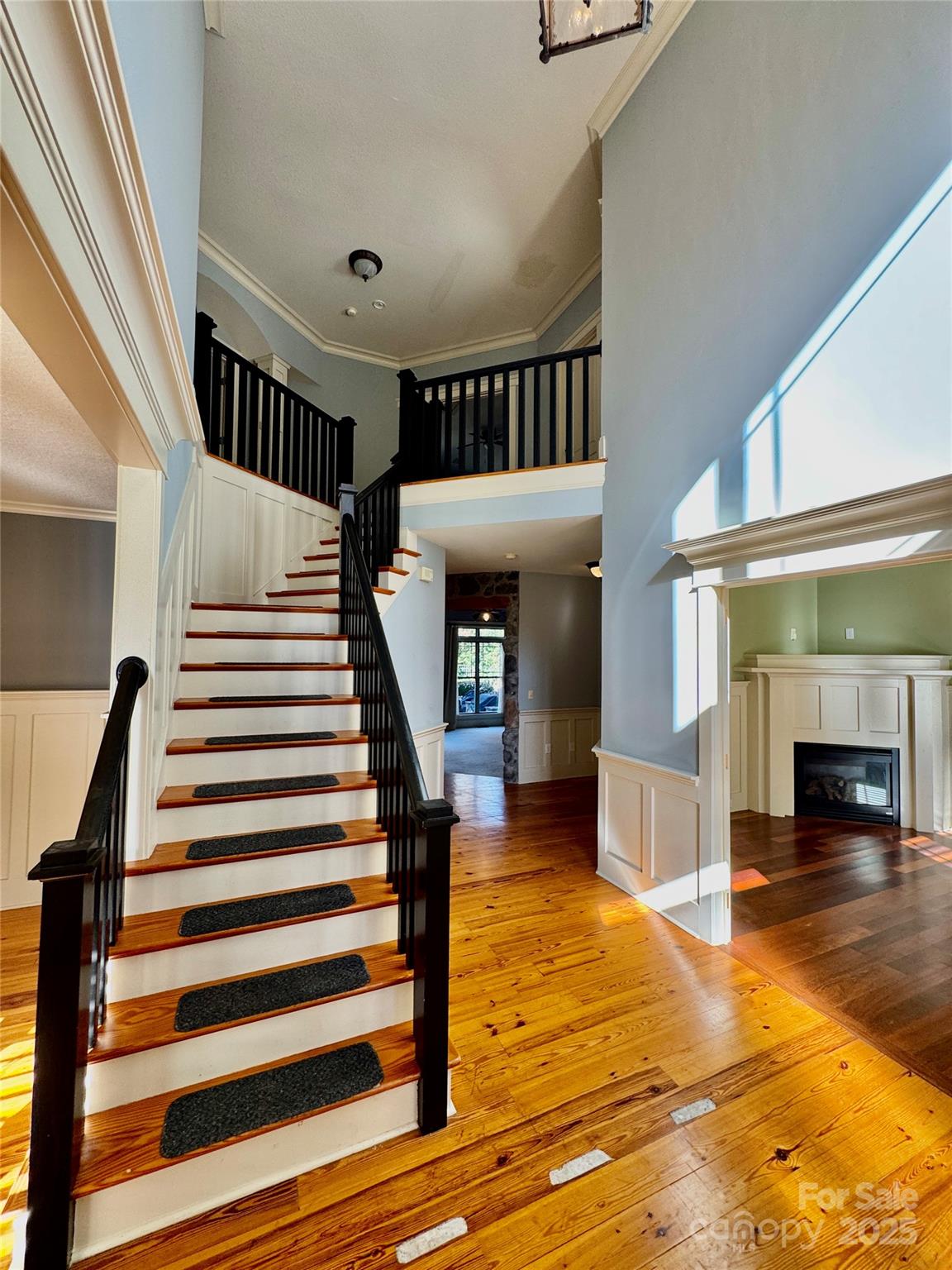 600 Baron Road Waxhaw, NC 28173 - Photo 9 of 42 a view of entryway and hall with wooden floor