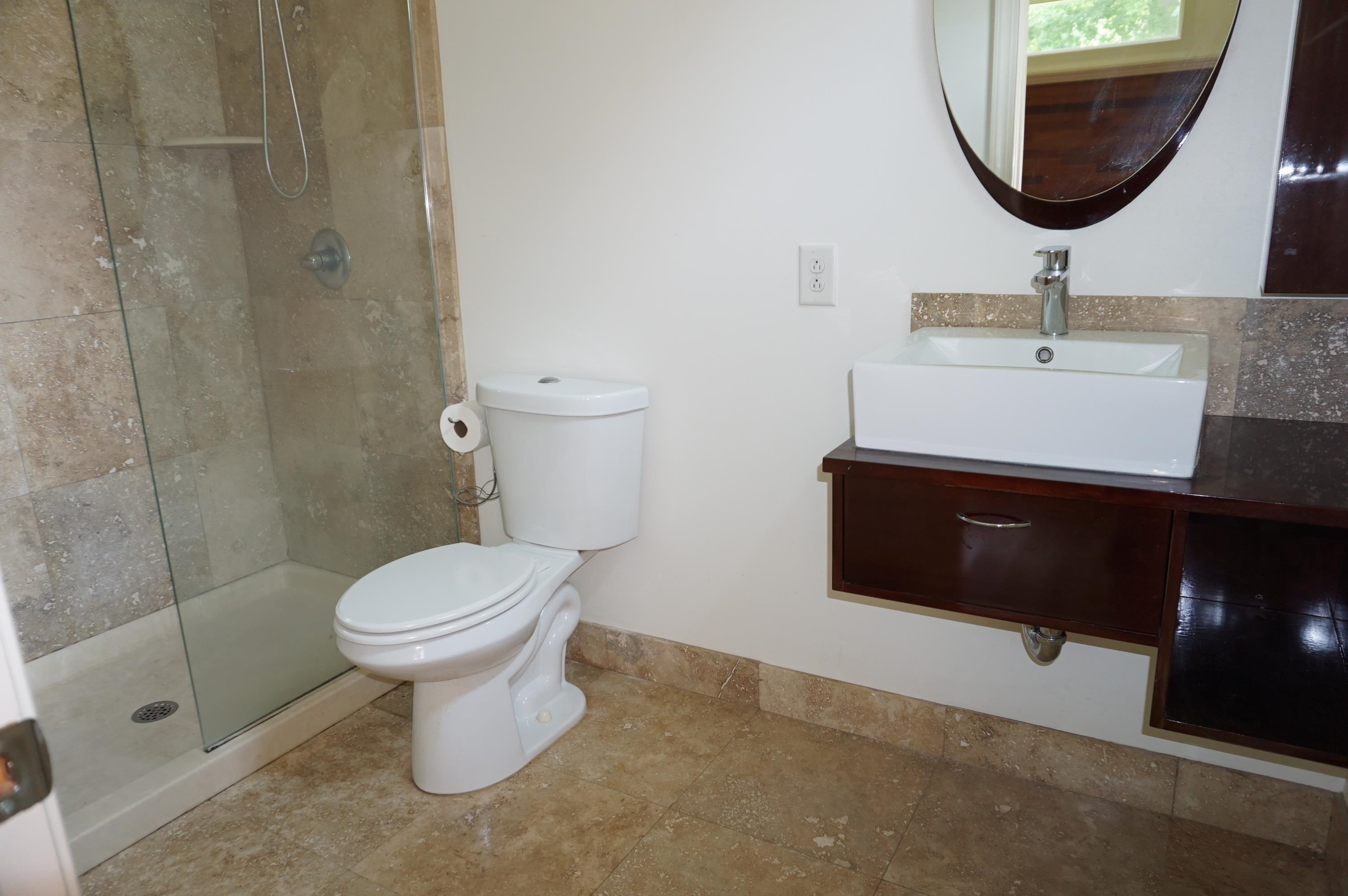 523 East Edenton Street Raleigh, NC 27601 - Photo 21 of 53 a bathroom with a sink toilet and a mirror