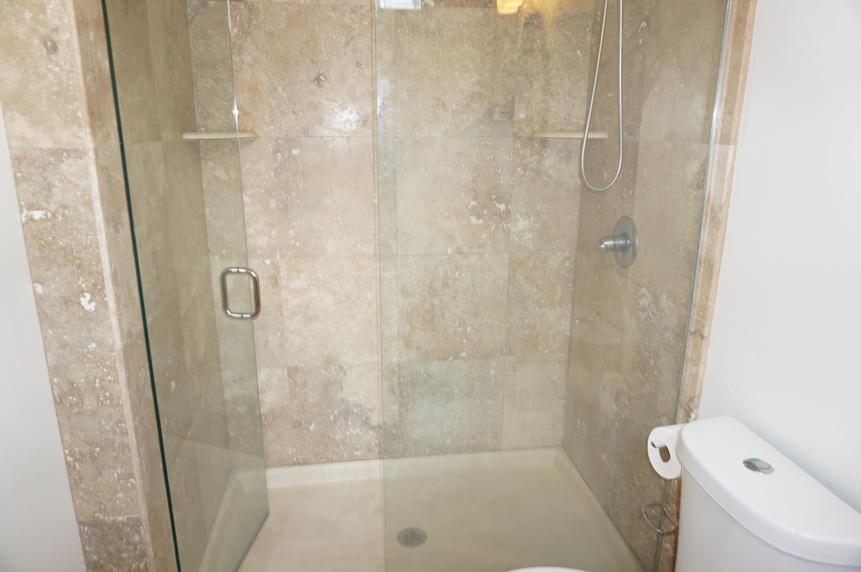 523 East Edenton Street Raleigh, NC 27601 - Photo 25 of 53 a bathroom with a shower and toilet