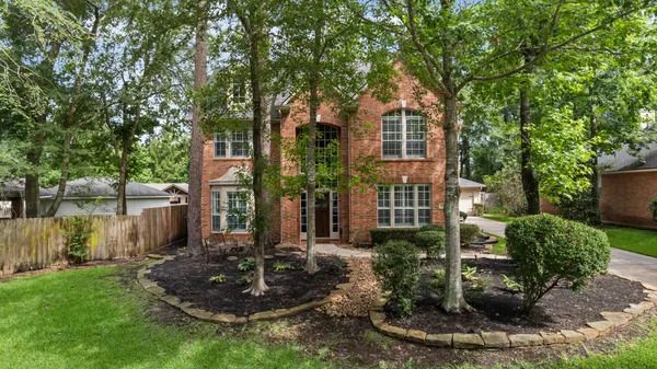 $699,500 | 59 North Bluff Creek Circle, The Woodlands, TX 77382