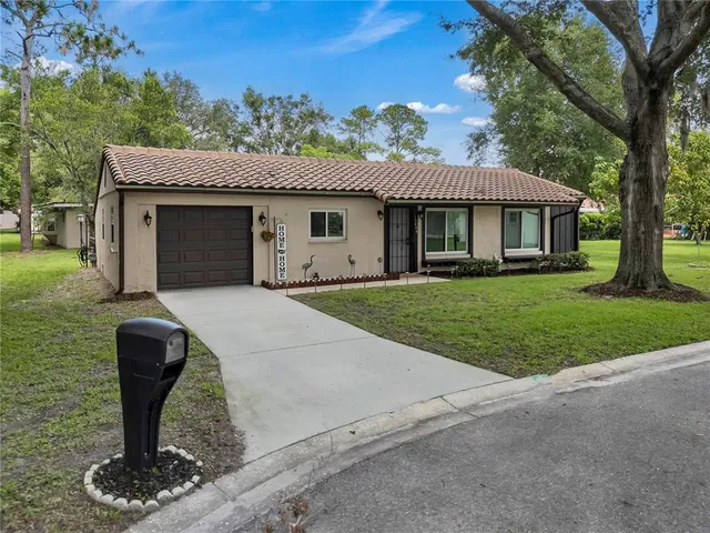 a house view with a garden space