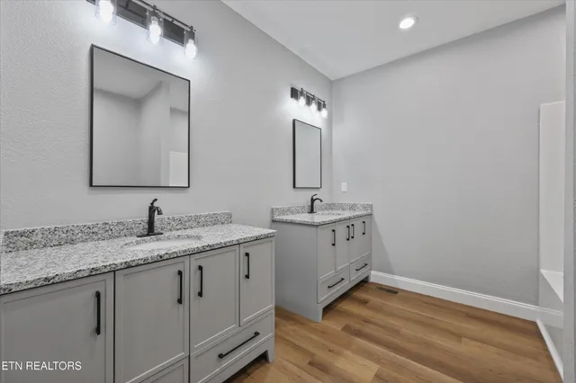 a bathroom with a shower and a toilet