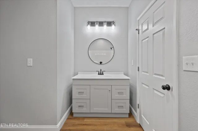 a bathroom with a bathtub and a toilet