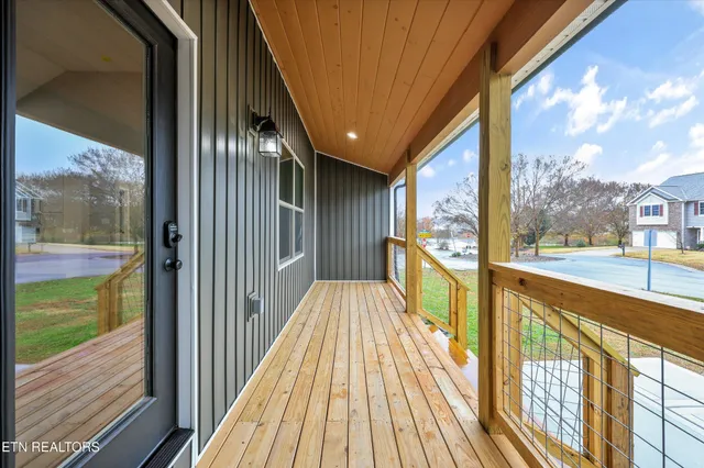 a front view of a house with large windows