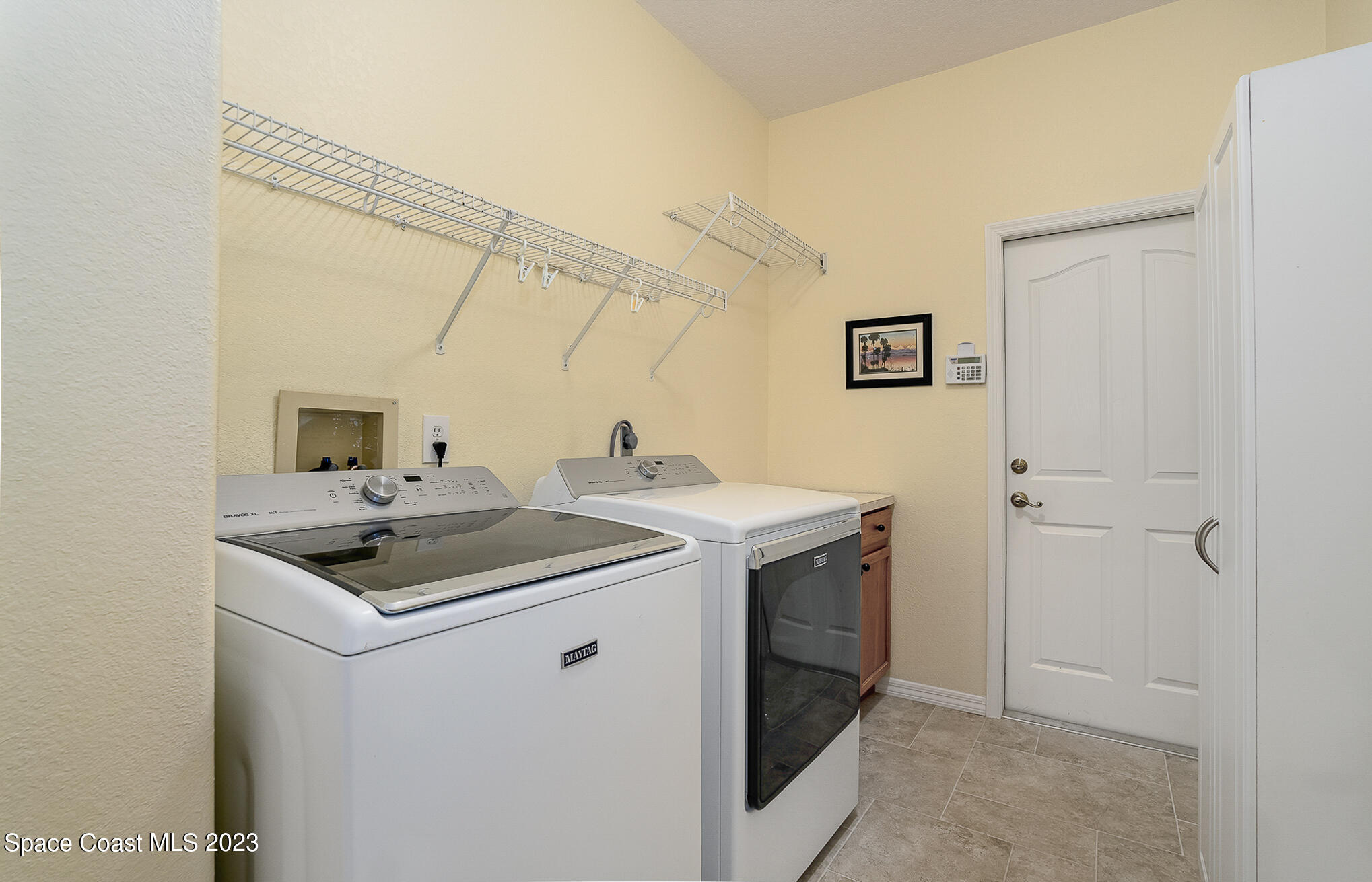 4105 Sand Ridge Drive Merritt Island, FL 32953 - Photo 22 of 31 a utility room with dryer and washer