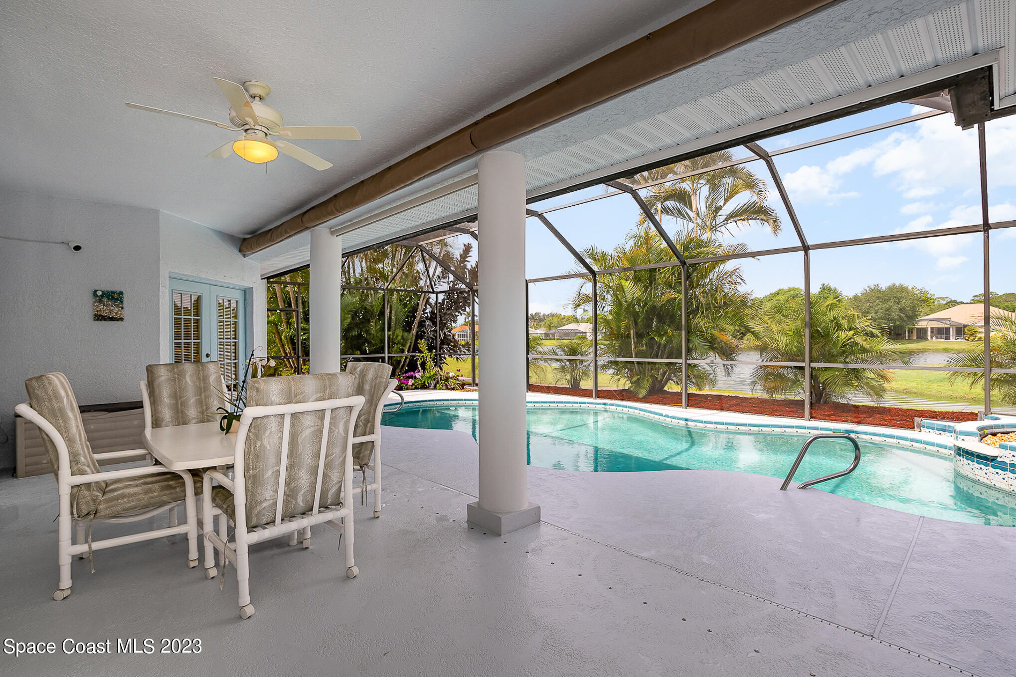 4105 Sand Ridge Drive Merritt Island, FL 32953 - Photo 23 of 31 a view of a dining room with furniture window and outside view