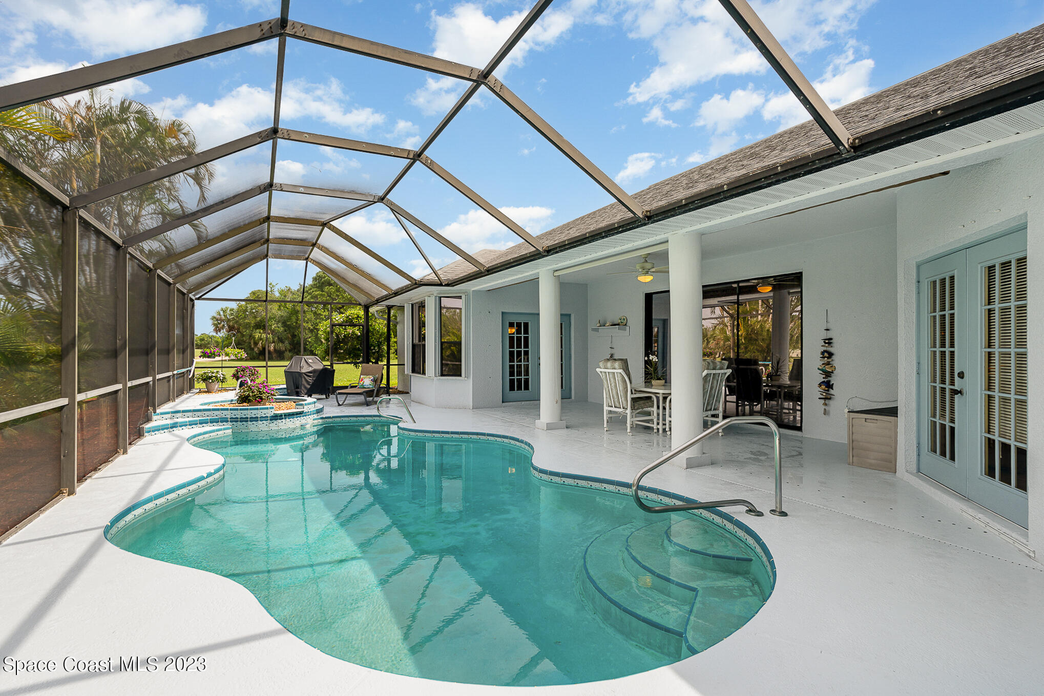 4105 Sand Ridge Drive Merritt Island, FL 32953 - Photo 24 of 31 a view of a swimming pool with a patio