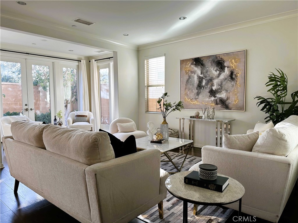 92 Birmingham Irvine, CA 92620 - Photo 1 of 1 a living room with furniture and a large window