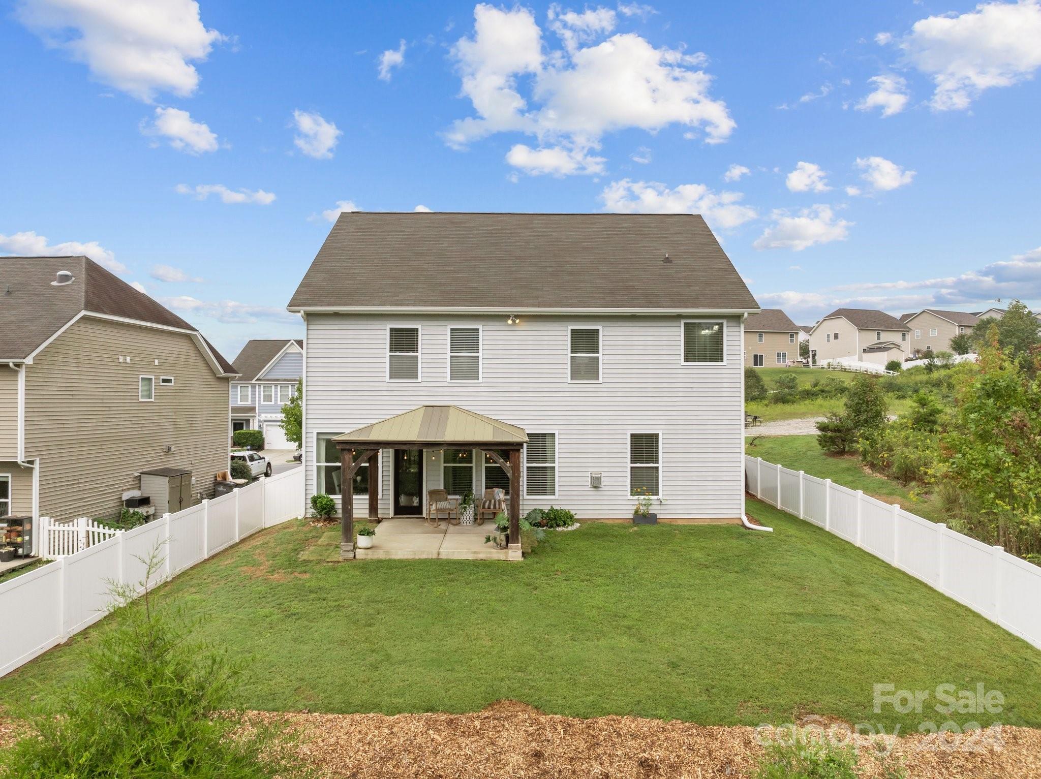 3434 Streamside Drive Davidson, NC 28036 - Photo 28 of 34 a view of a house with a backyard