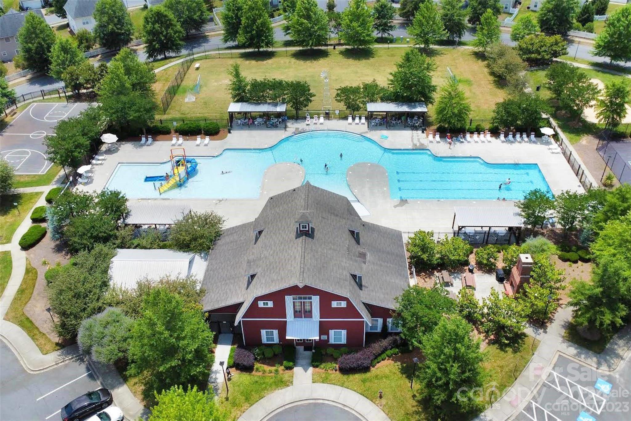3434 Streamside Drive Davidson, NC 28036 - Photo 34 of 34 an aerial view of a house with outdoor space and a lake view in back