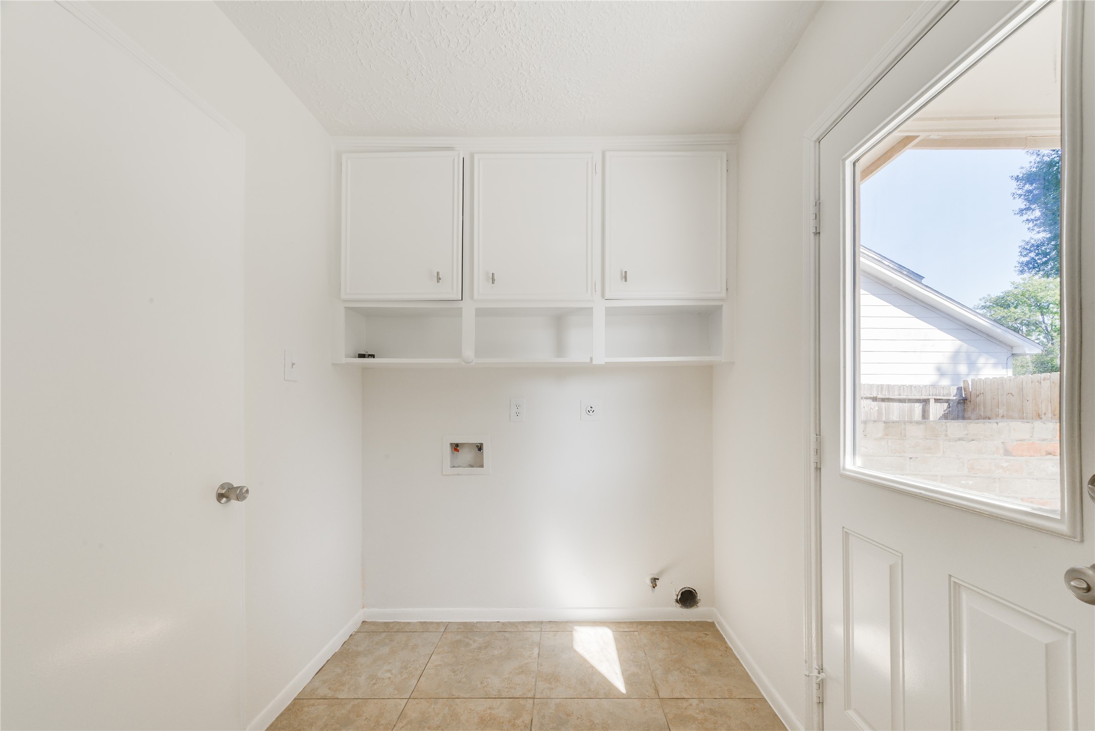 18318 Ella Boulevard Spring, TX 77388 - Photo 14 of 50 a view of storage and utility room with a window