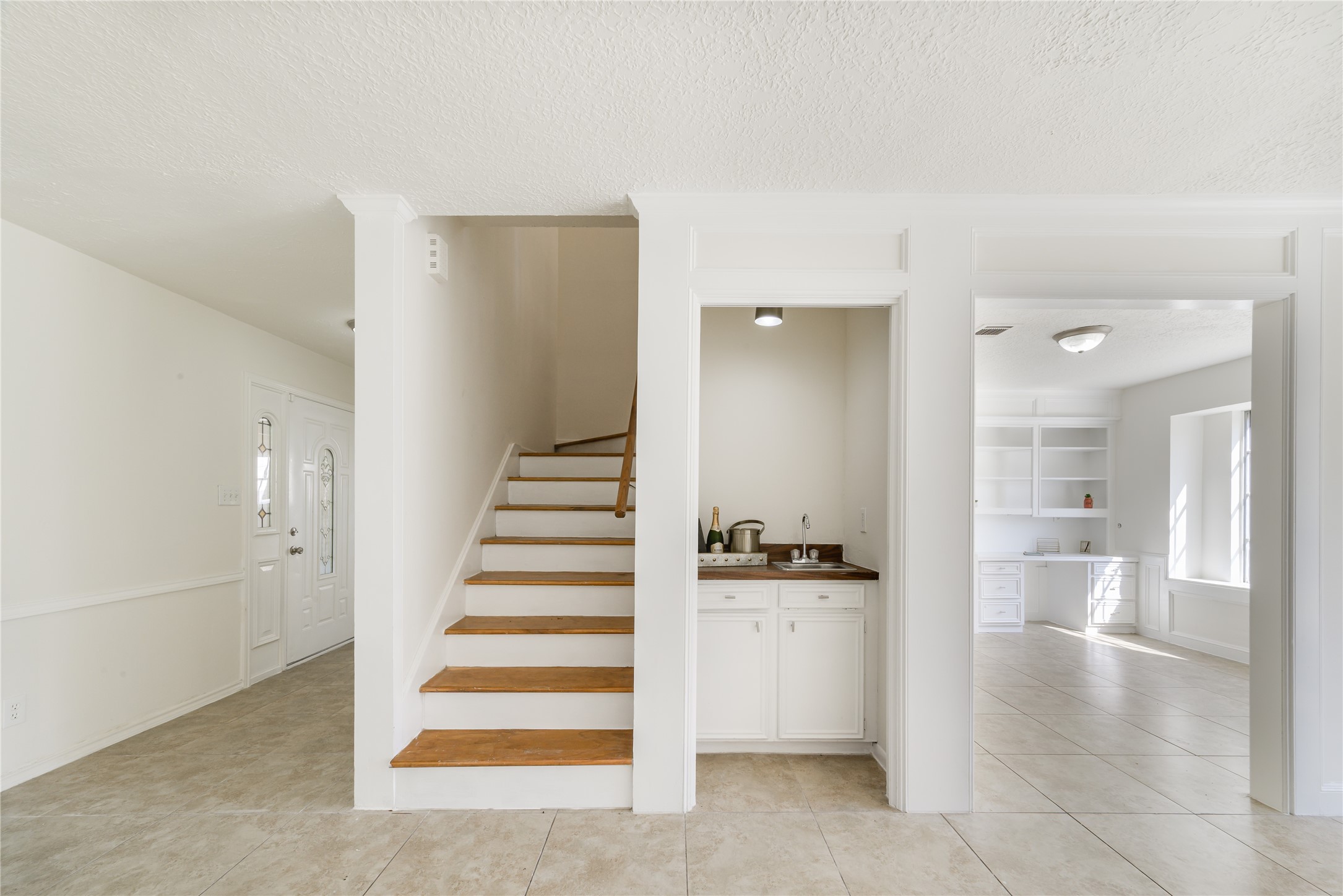 18318 Ella Boulevard Spring, TX 77388 - Photo 15 of 50 a view of a hallway with kitchen and entryway