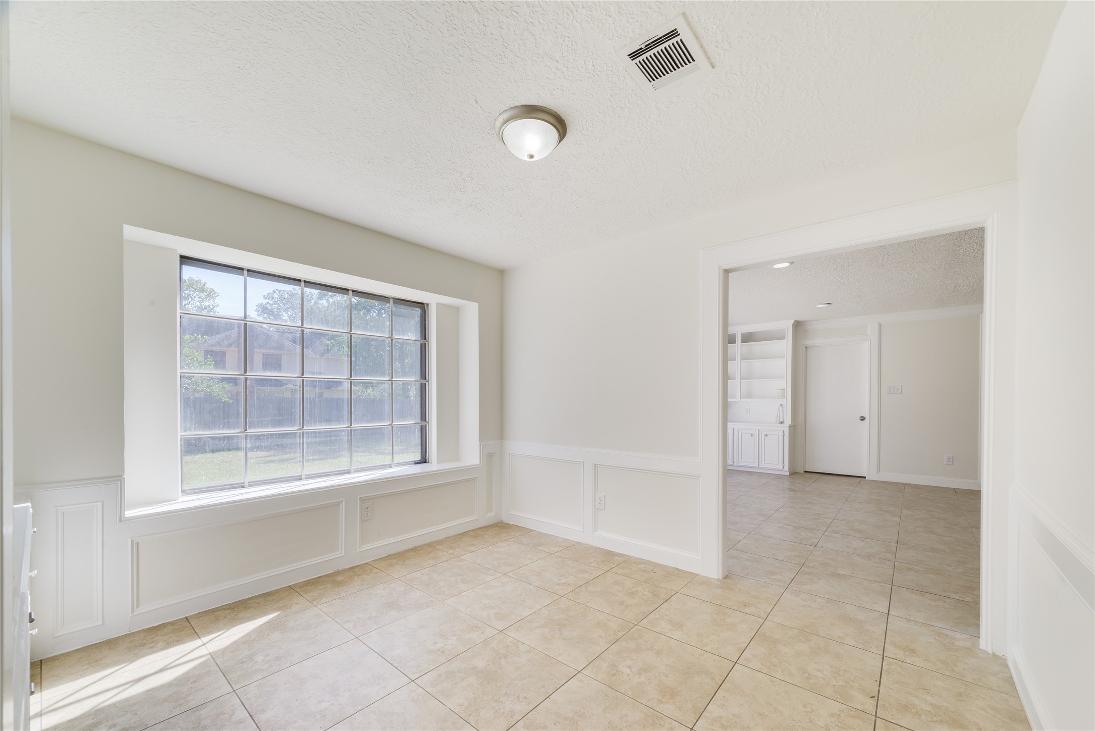 18318 Ella Boulevard Spring, TX 77388 - Photo 23 of 50 a view of an empty room with a window