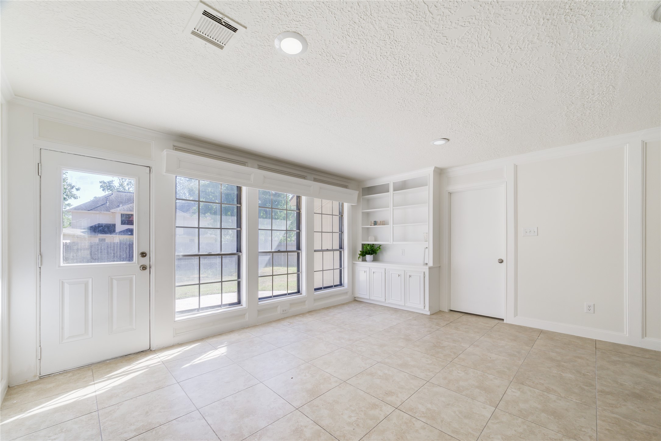 18318 Ella Boulevard Spring, TX 77388 - Photo 27 of 50 an empty room with windows