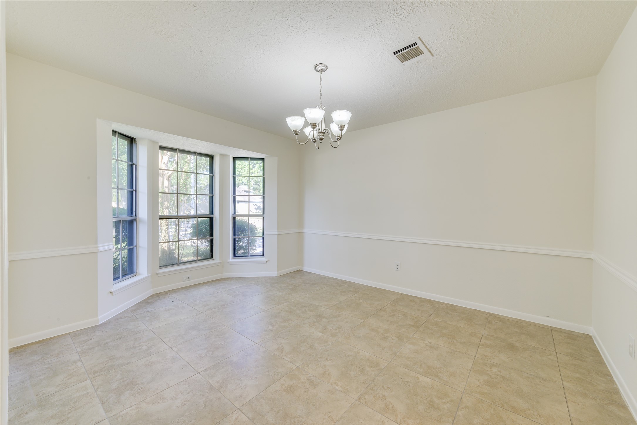 18318 Ella Boulevard Spring, TX 77388 - Photo 4 of 50 a view of an empty room with a window
