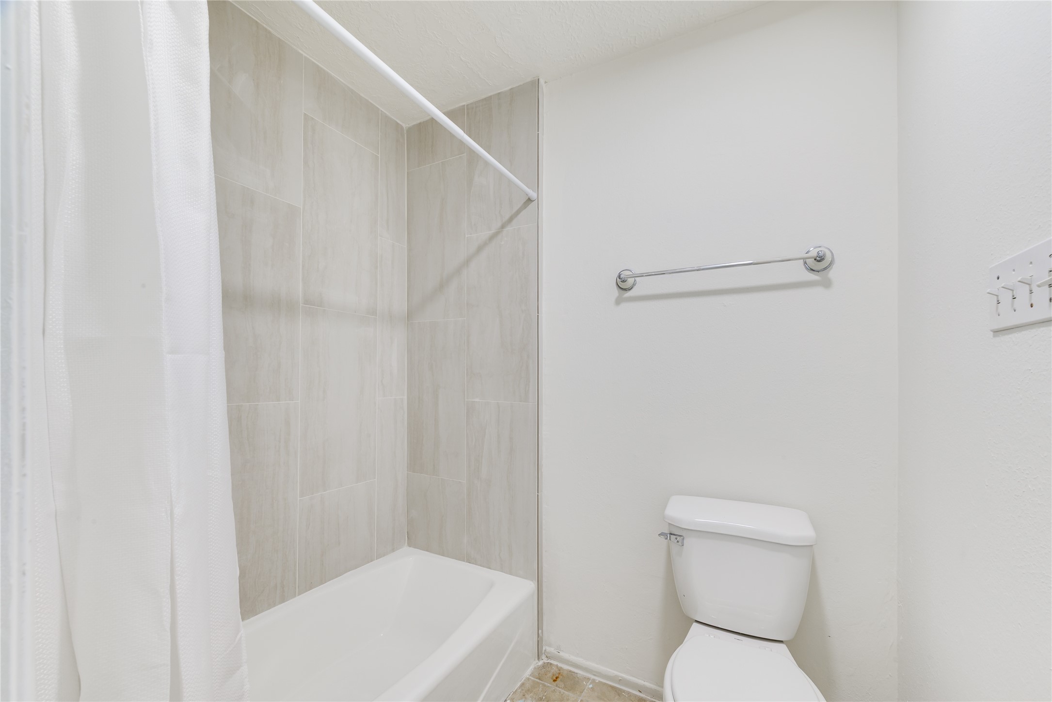 18318 Ella Boulevard Spring, TX 77388 - Photo 43 of 50 a white toilet sitting next to a white sink