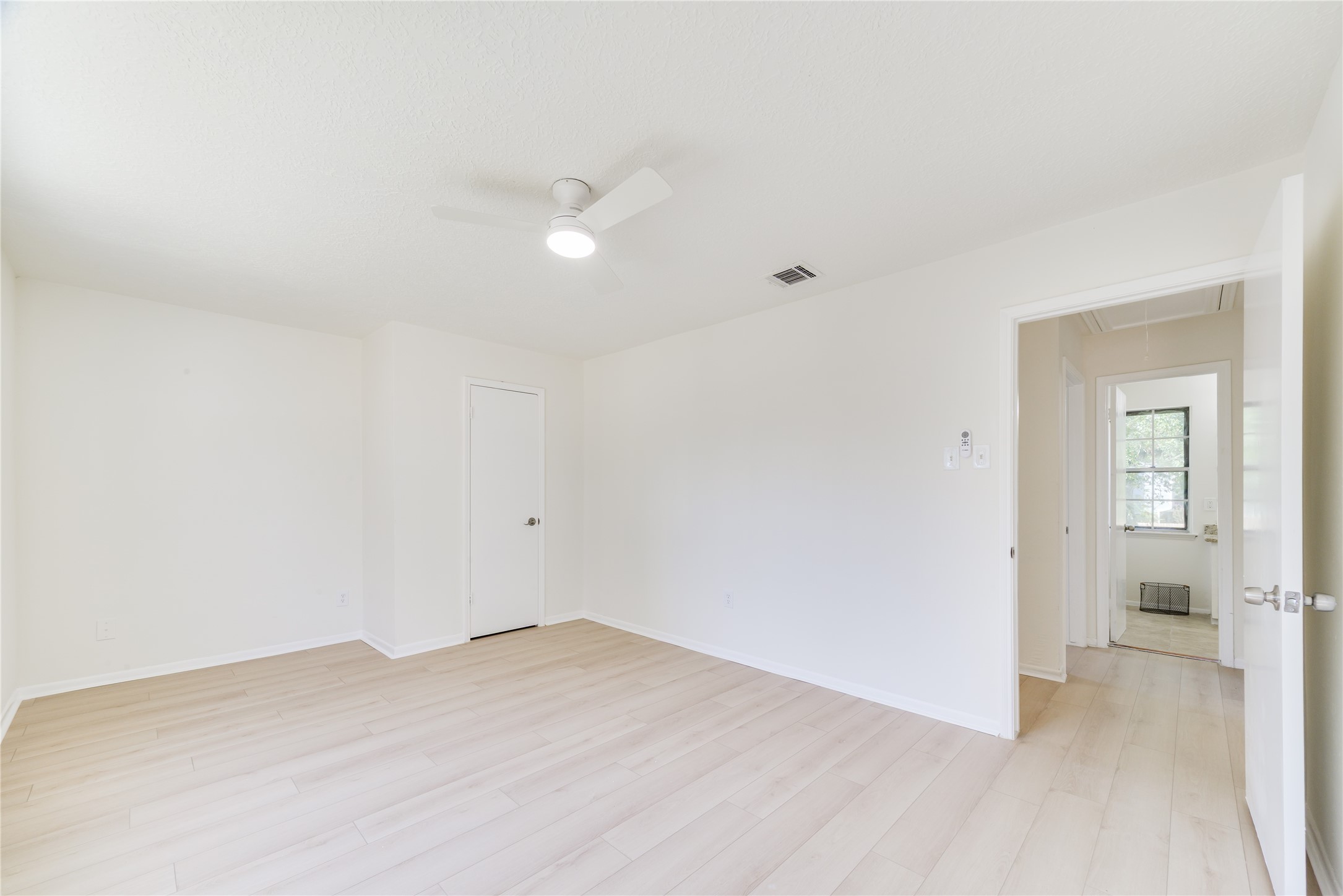 18318 Ella Boulevard Spring, TX 77388 - Photo 46 of 50 a view of a room with wooden floor and a bathroom