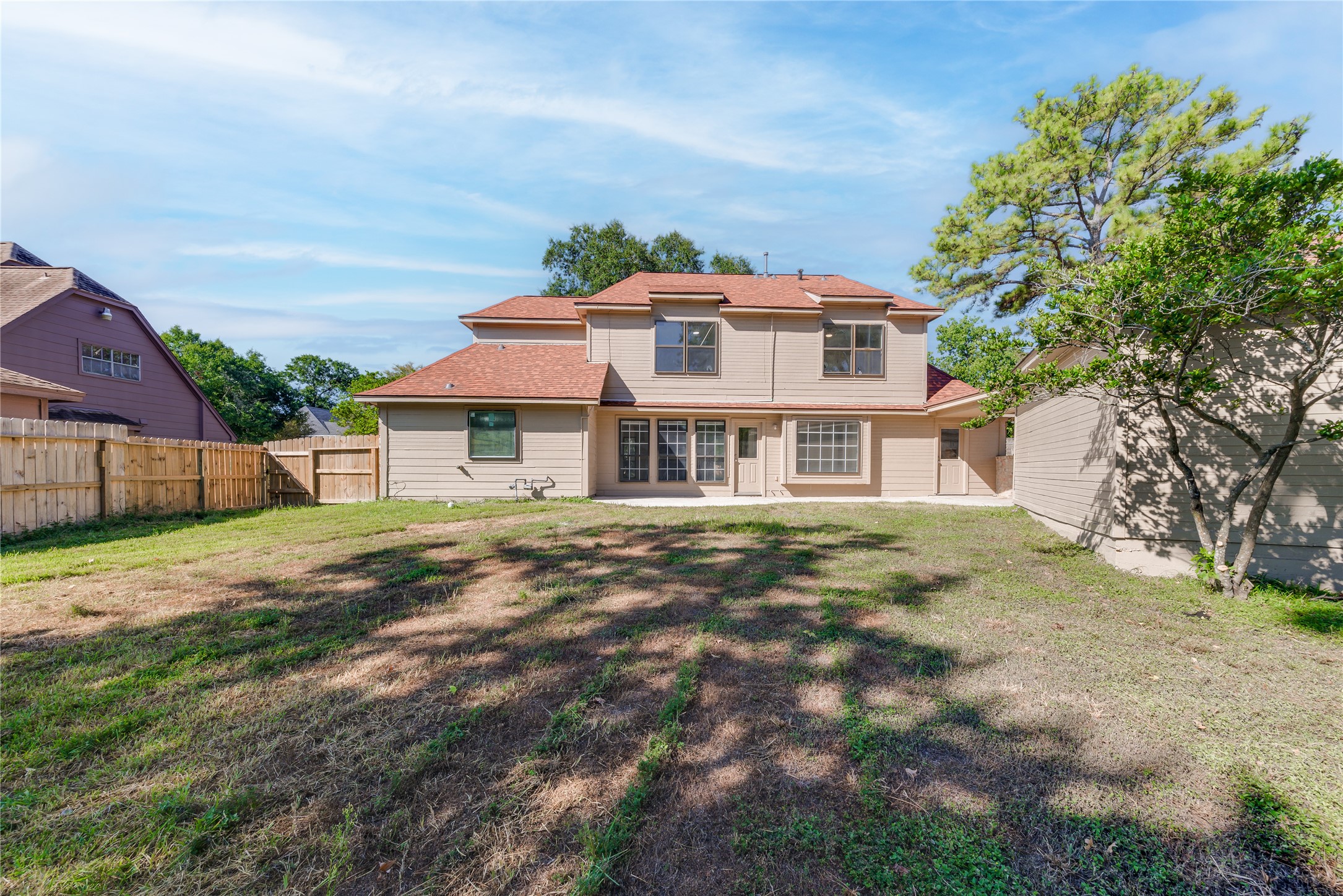 18318 Ella Boulevard Spring, TX 77388 - Photo 49 of 50 a front view of a house with a garden