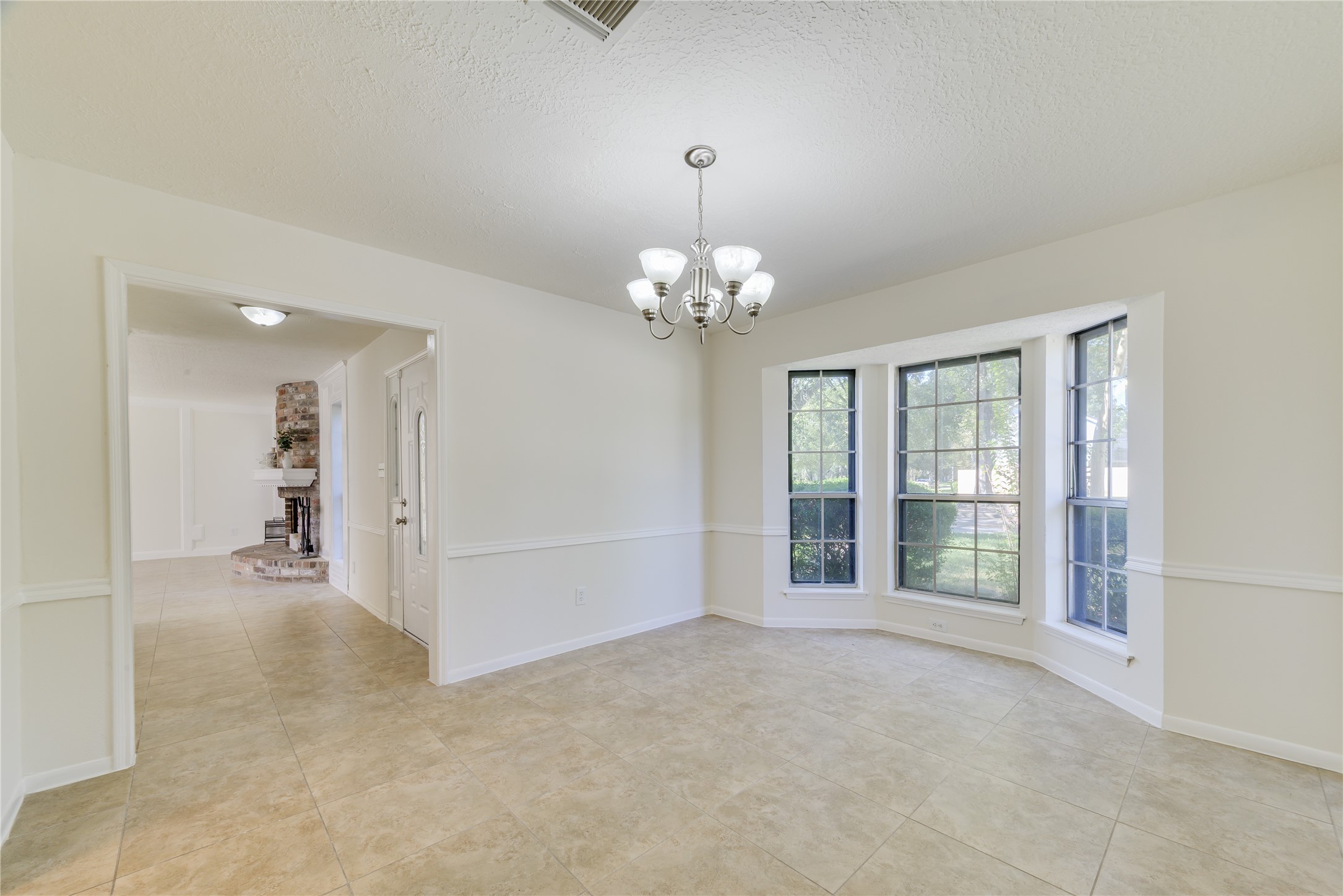 18318 Ella Boulevard Spring, TX 77388 - Photo 5 of 50 wooden floor in an empty room with a window