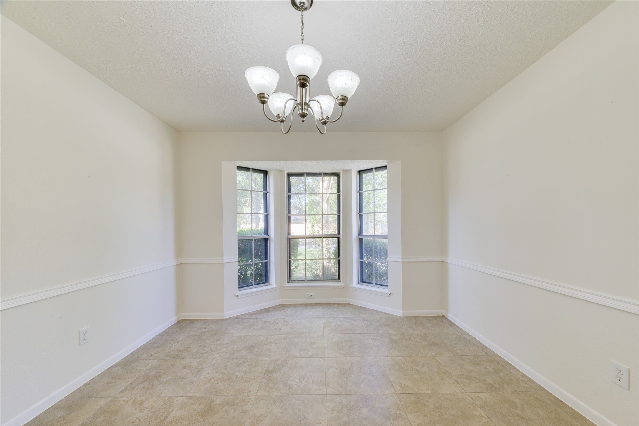 18318 Ella Boulevard Spring, TX 77388 - Photo 6 of 50 a view of an empty room with a window