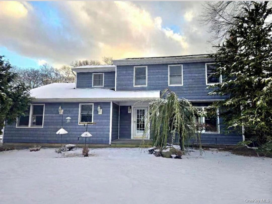22 Rustic Road Yaphank, NY 11980 - Photo 2 of 35 Traditional-style house with a porch