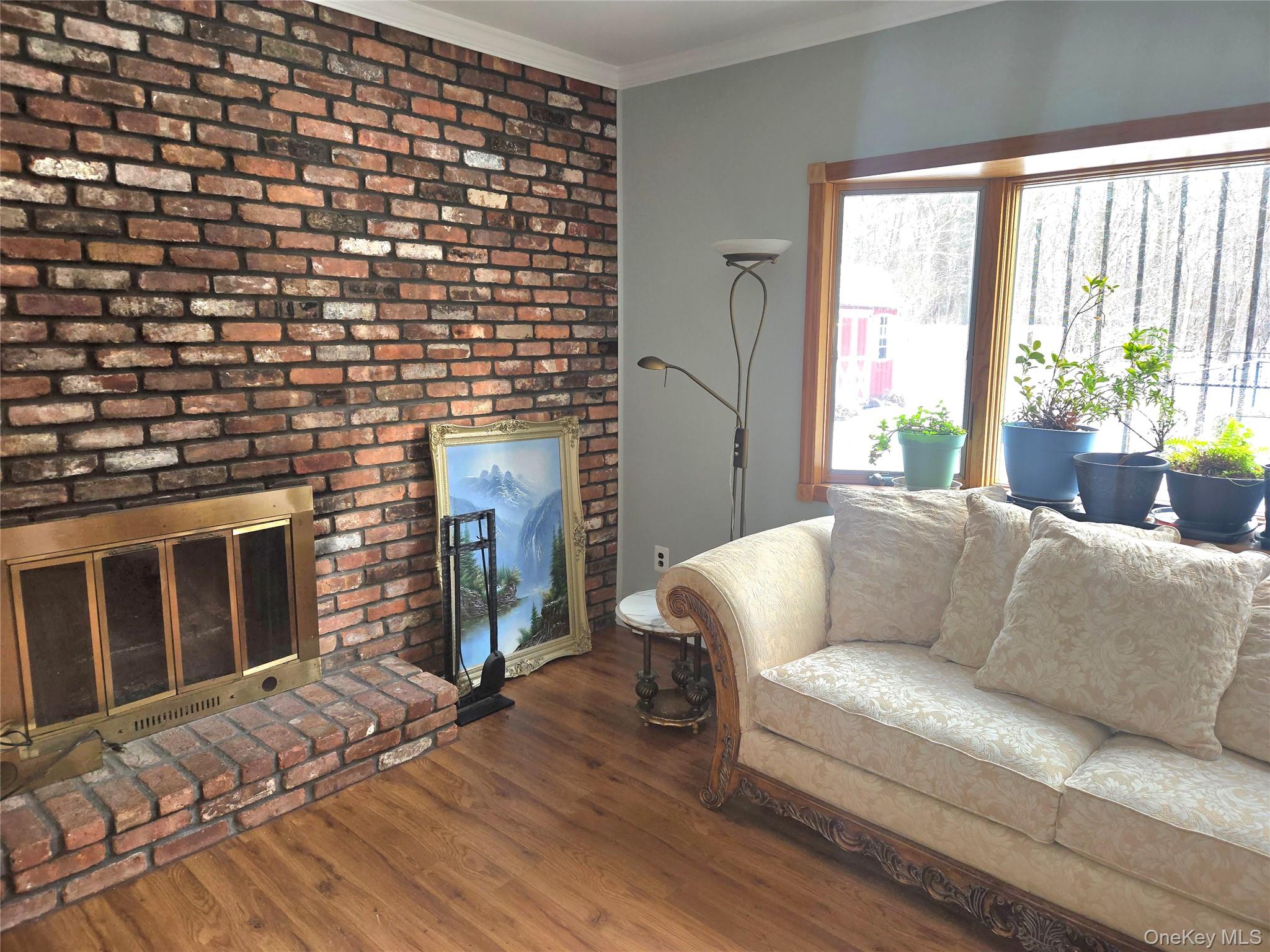 22 Rustic Road Yaphank, NY 11980 - Photo 21 of 35 Den with wood burning fireplace