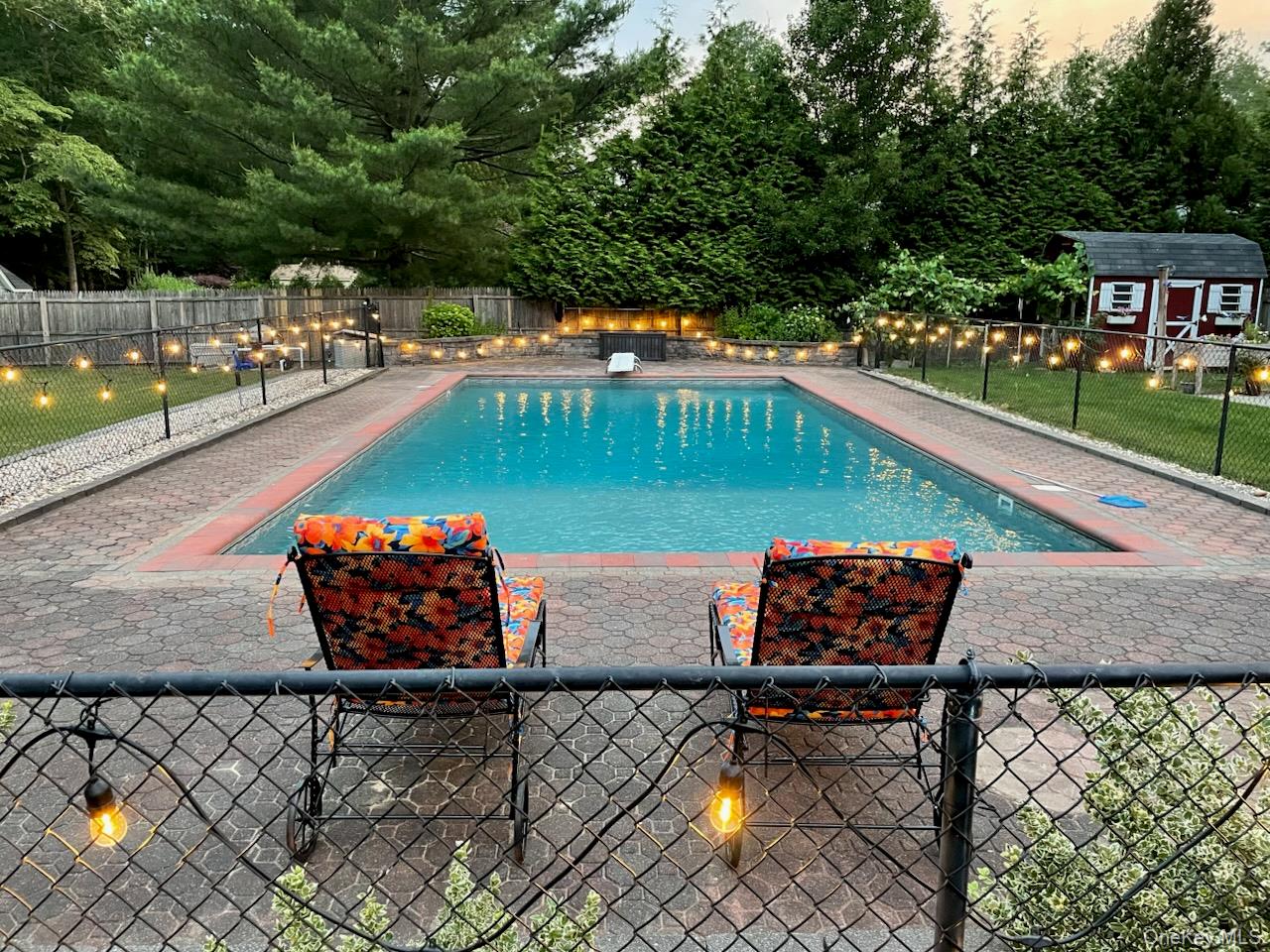 22 Rustic Road Yaphank, NY 11980 - Photo 30 of 35 View of swimming pool with a fenced backyard and a patio area