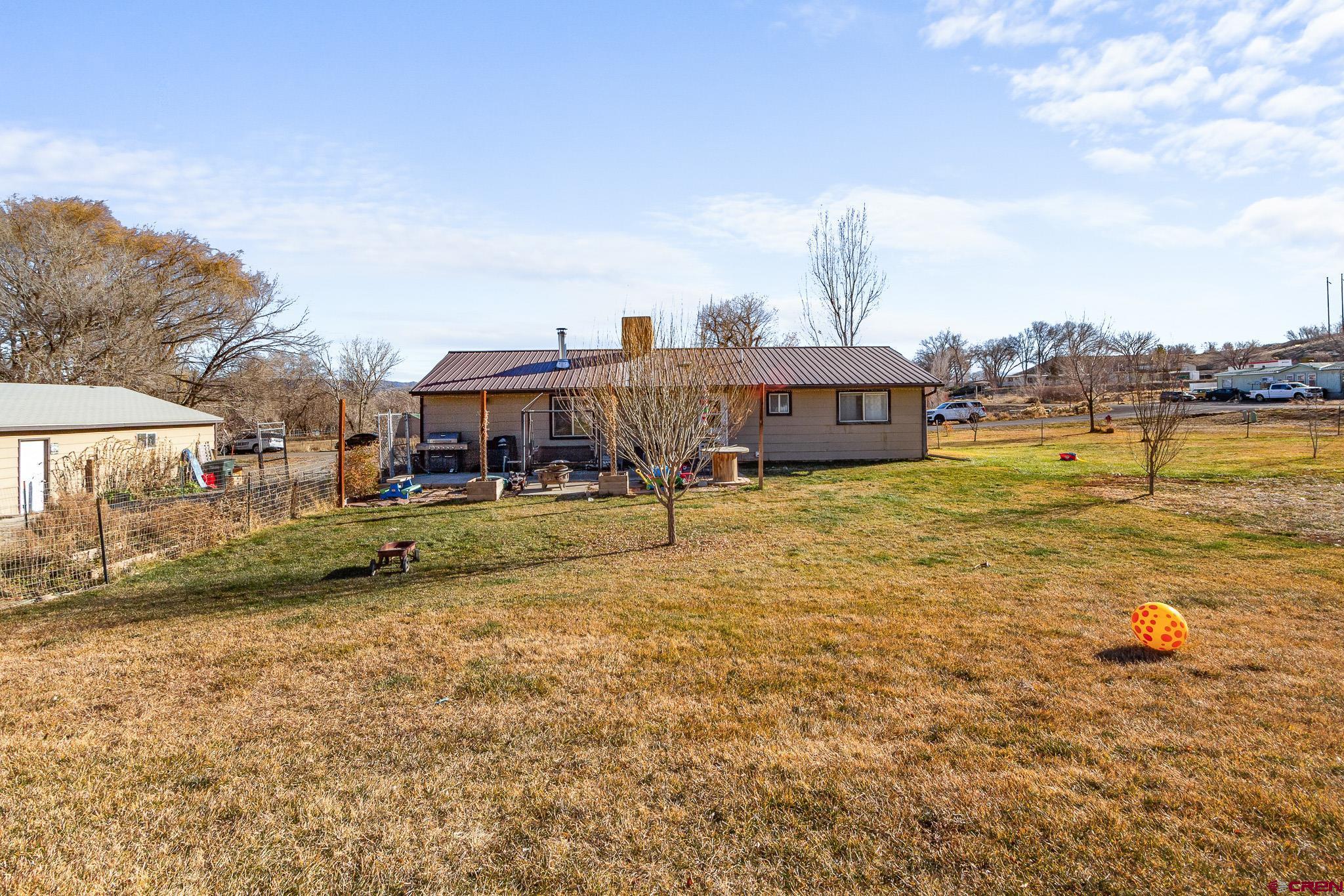 13330 L Road Montrose, CO 81401 - Photo 18 of 19 a view of a lake with houses